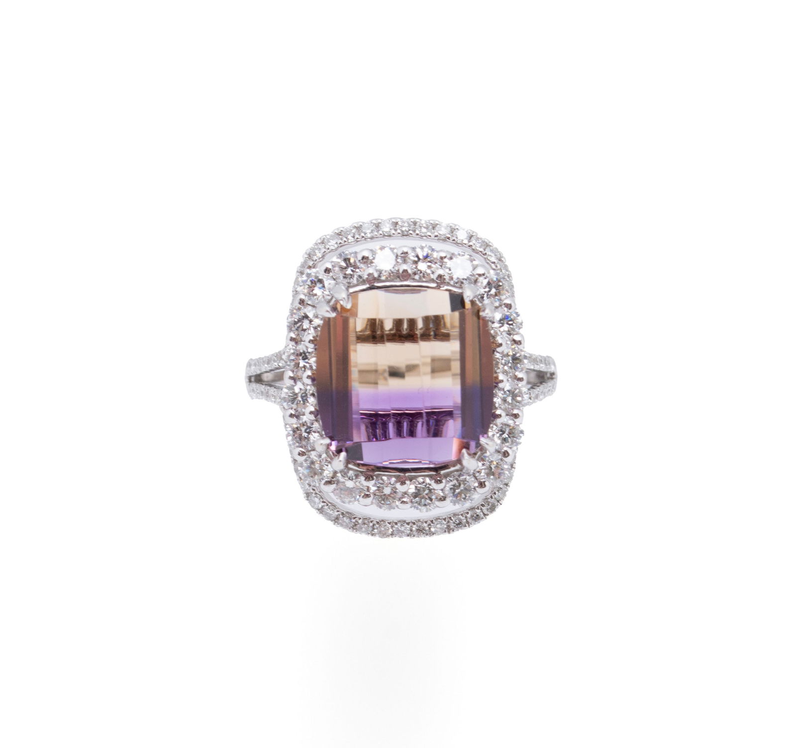 AMETRINE DIAMOND RING: AMETRINE DIAMOND RING An 18k white gold ring set with one (1) cushion cut faceted ametrine measuring 12mm surrounded by a double row of round brilliant cut diamonds consisting of ninety-four (94)