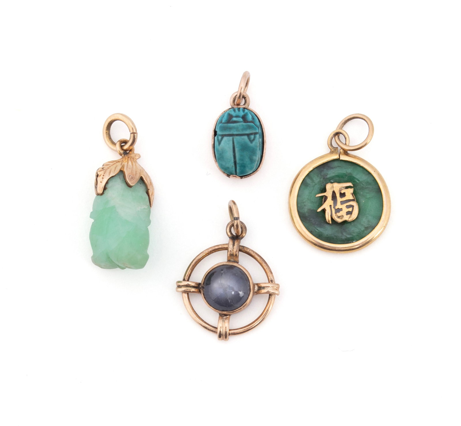 FOUR GOLD JADE AND STONE CHARMS (1 of 11)