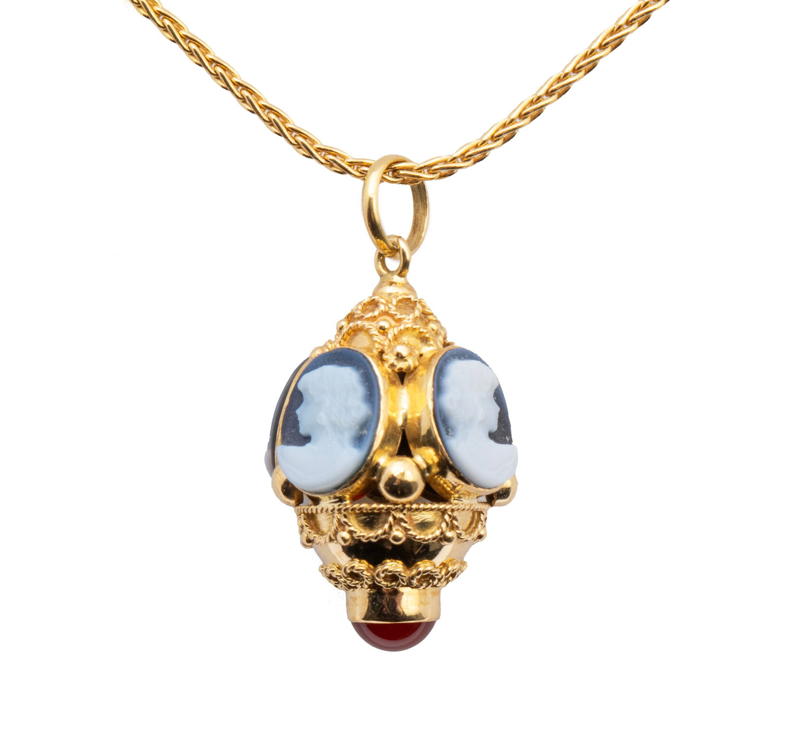 YELLOW GOLD CAMEO PENDANT NECKLACE: YELLOW GOLD CAMEO PENDANT NECKLACE A 14k yellow gold cable chain suspending an 18k yellow gold pendant set with four (4) oval carved black and white cameos each measuring approximately 10mm x 8mm, a