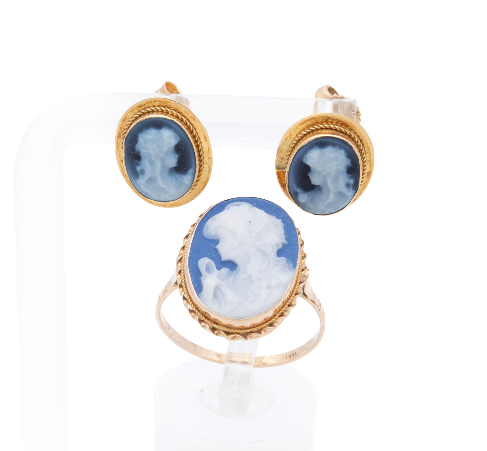 CAMEO RING AND EARRINGS: CAMEO RING AND EARRINGS A 14k yellow gold ring set with one (1) oval blue and white cameo measuring 16.7mm x 12mm. Along with an 18k yellow gold pierced earrings set with (2) two oval blue and white