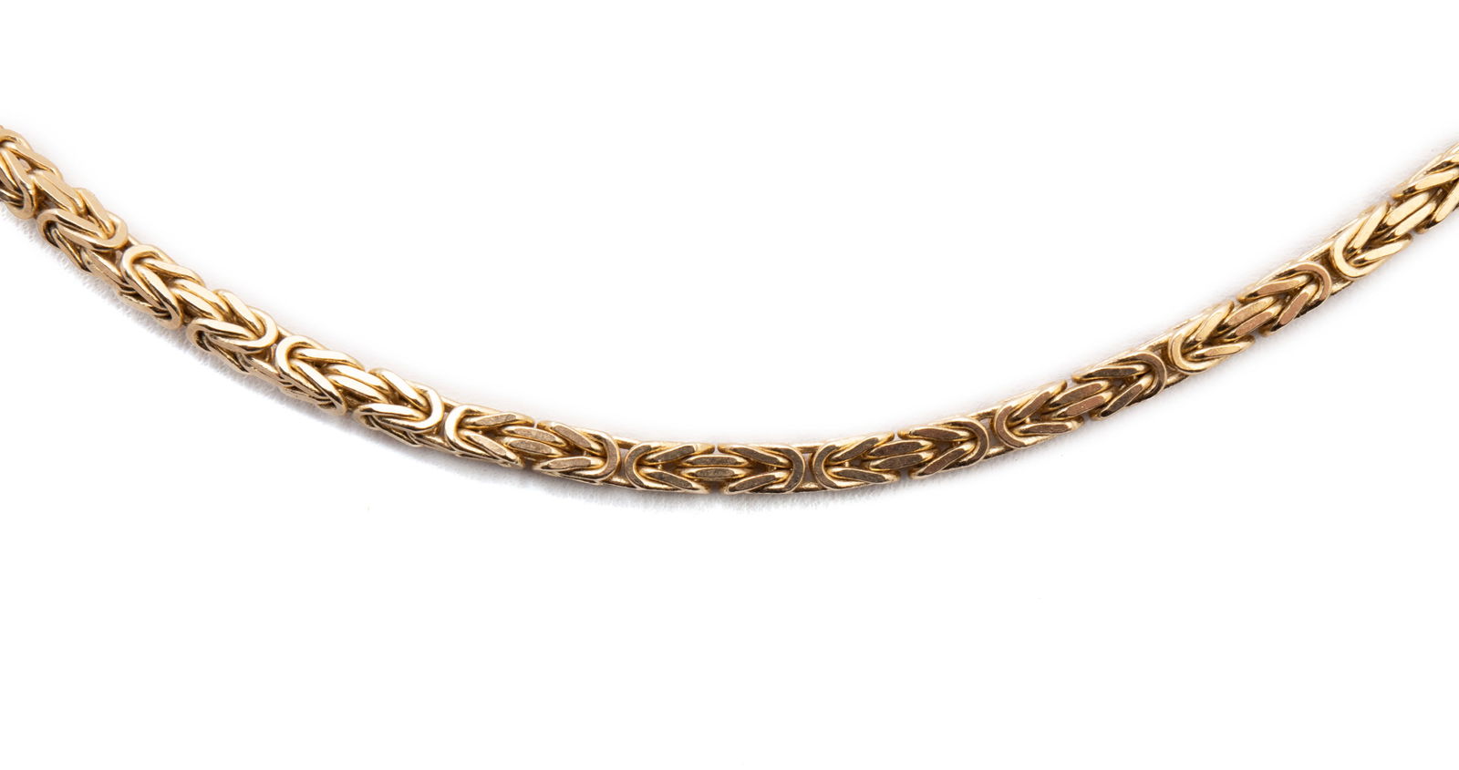 BYZANTINE GOLD CHAIN NECKLACE: BYZANTINE GOLD CHAIN NECKLACE A 14k yellow gold chain measuring 2.5mm. Length: 24 in. (61 cm.); 29 grams
