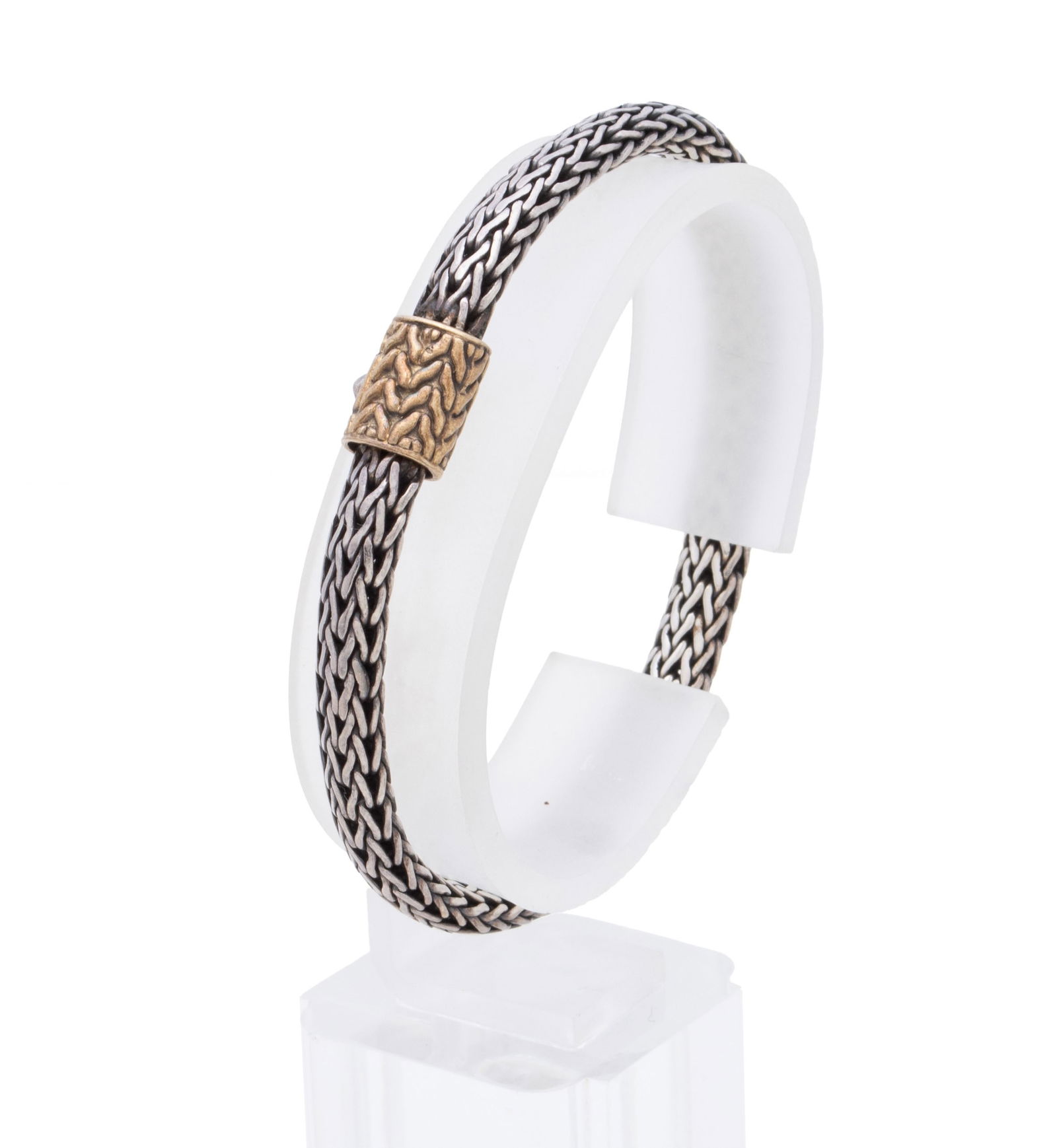 JOHN HARDY 'ICON' BRACELET: JOHN HARDY 'ICON' BRACELET A classic sterling silver bracelet with yellow gold accent. Original box. Clasp marked 925 18k. Length: 7 3/4 in. (19.7 cm.); 26 grams