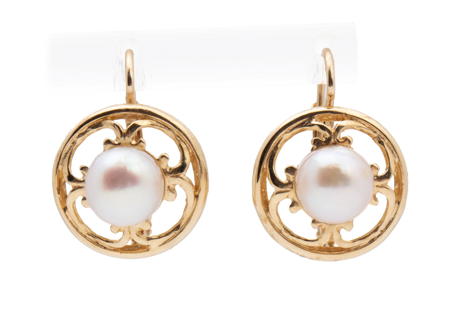 PEARL GOLD EARRINGS: PEARL GOLD EARRINGS Italian, a pair of 14k yellow gold pierced earrings with an open round deign set with two (2) 7.3 mm pearls, lever backs. Hallmarked Italy 14k DAG. 5.6 grams