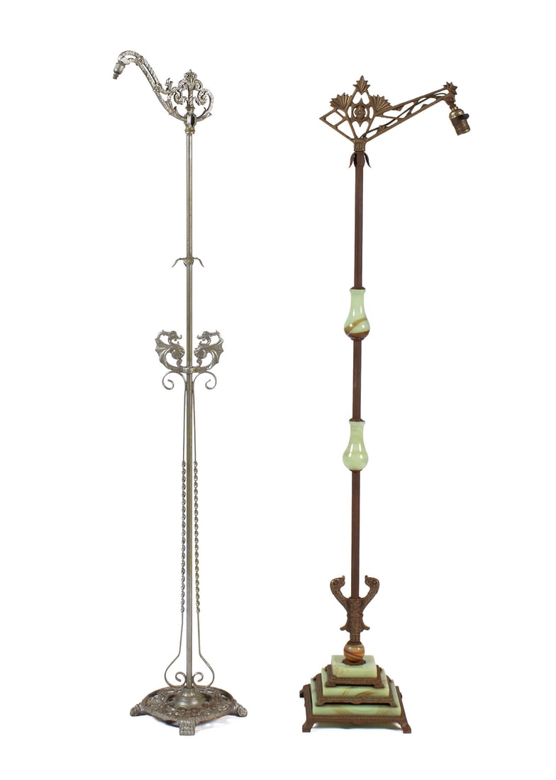 TWO FLOOR LAMPS: TWO FLOOR LAMPSAmerican, circa 1920s. Both metal with scrolling and foliate highlights, one (1) with onyx highlights up the shaft.Larger: 60 x 11 in. (152.4 x 27.9 cm.)