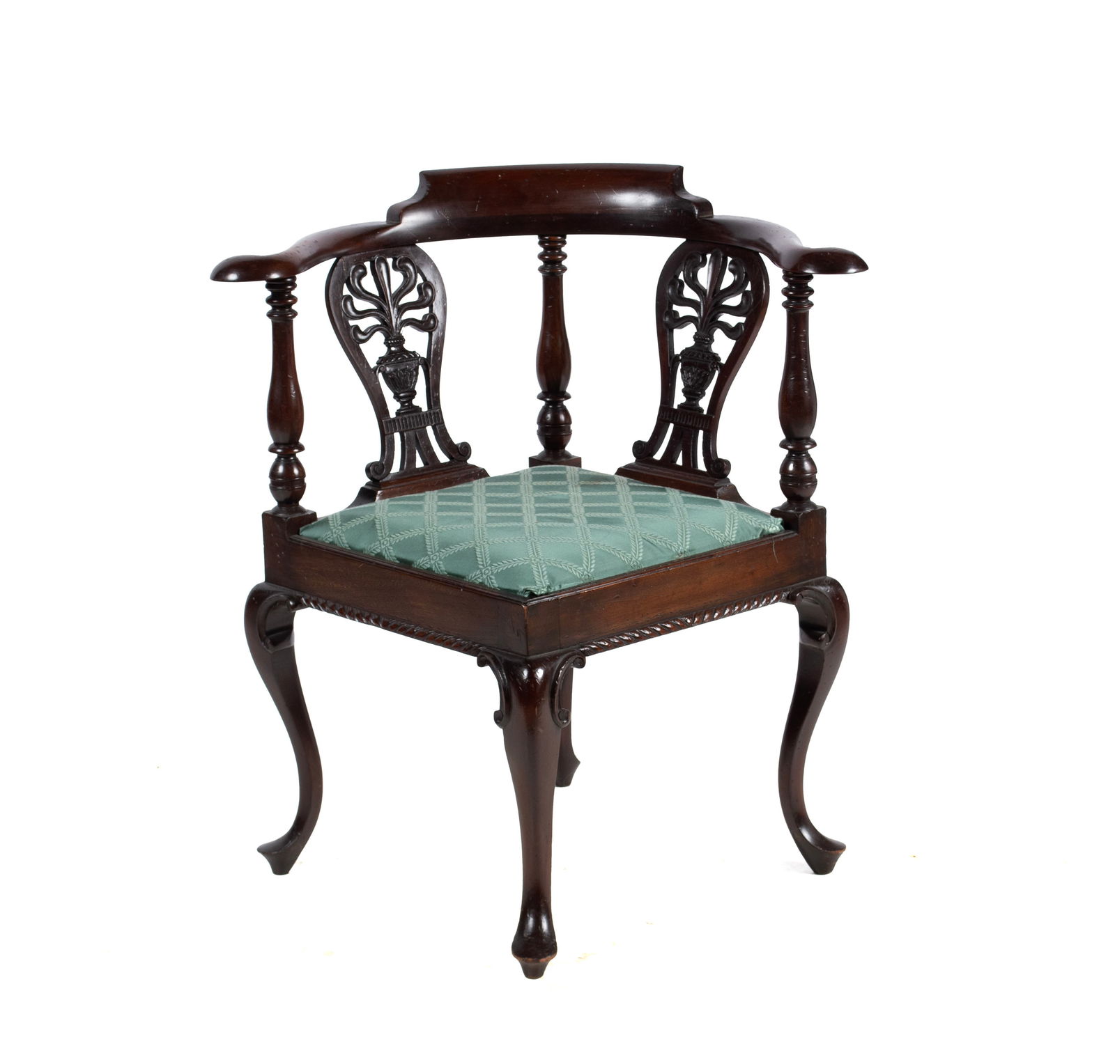 GEORGIAN CORNER CHAIR: GEORGIAN CORNER CHAIR English, 19th century. Pierced splats carved with flowering urns and wraparound armrest above, over the drop-in seat, on cabriole legs ending with pad feet. 32 1/2 x 30 x 27 in.