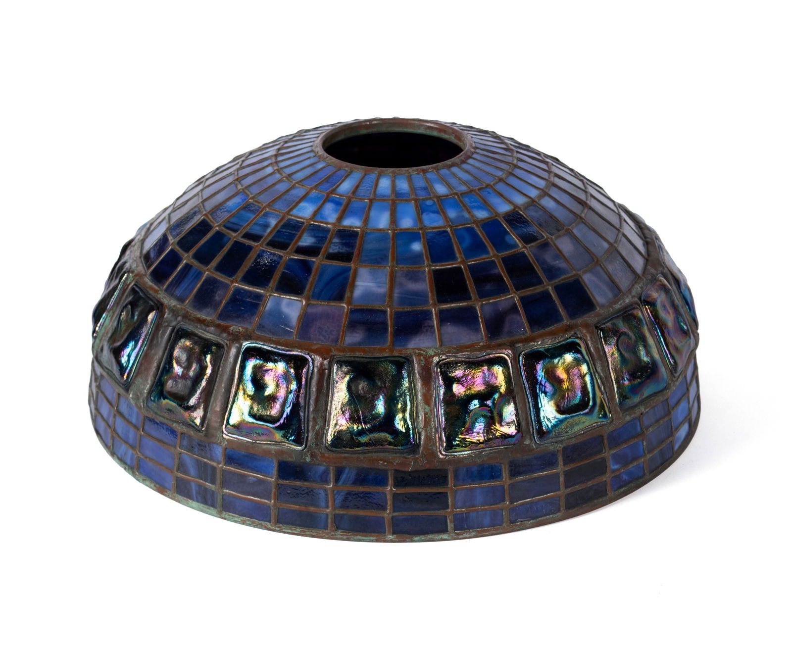 TIFFANY STYLE TURTLEBACK LAMP SHADE: TIFFANY STYLE TURTLEBACK LAMP SHADEAmerican, early 20th century. Blue leaded glass panels throughout with a full band of matching turtle tiles. With spurious Tiffany tag.Height: 6.9 in. (17.5 cm.), Di