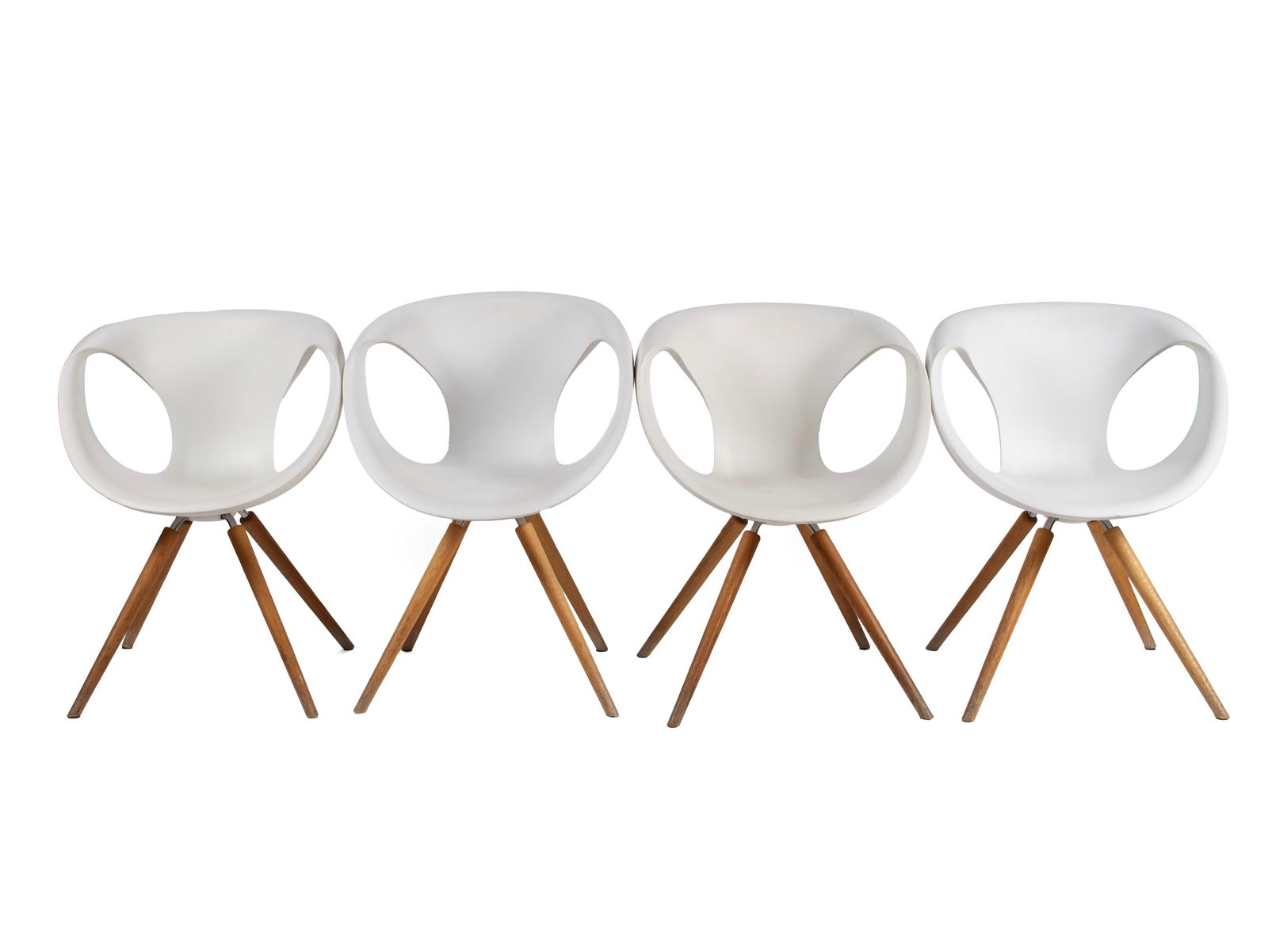 FOUR 'UP' CHAIRS BY TONON: FOUR 'UP' CHAIRS BY TONON Italian, designed by Martin Ballendat. Four (4) chairs with white polyurethane shells on wooden legs, marked under seat. Each: 32 1/4 x 24 in. (81.9 x 61 cm.)