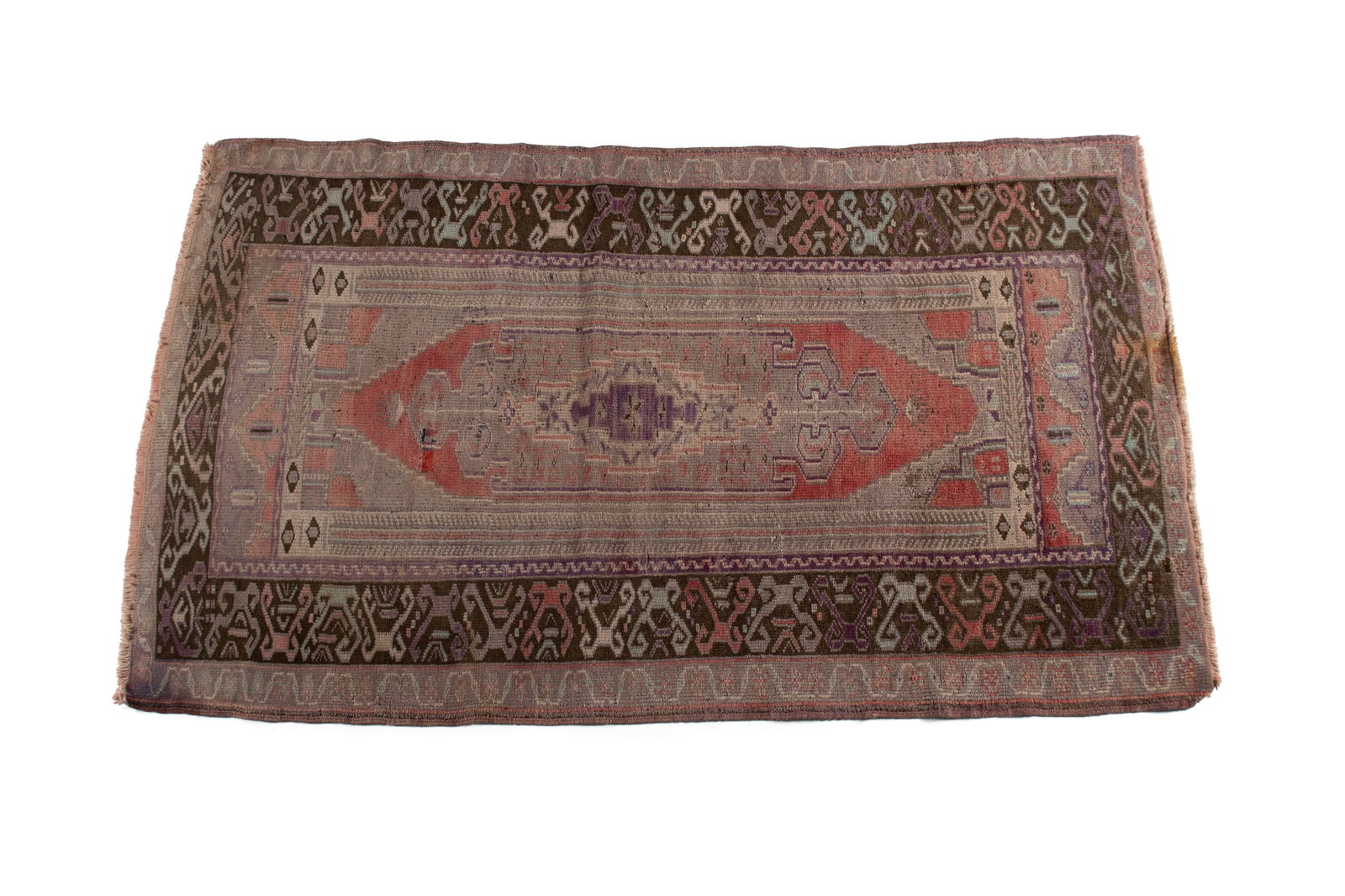 TURKISH THROW RUG: TURKISH THROW RUG Turkish, 20th century. Brown, ivory, and beige medallion centers the small lozenge form red field with beige corners and end panels, brown border decorated with geometric forms with