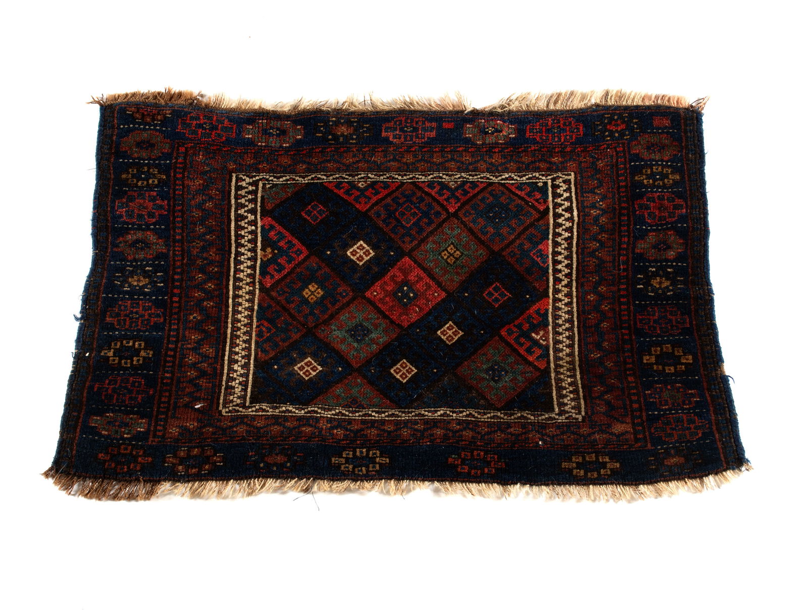 VERAMIN THROW RUG: VERAMIN THROW RUG Persian, early 20th century. Dark panels in shades of navy, red and brown with latch hook medallions, navy primary border with brown guard borders. 2 ft. 2 in. x 3 ft. 3 in.