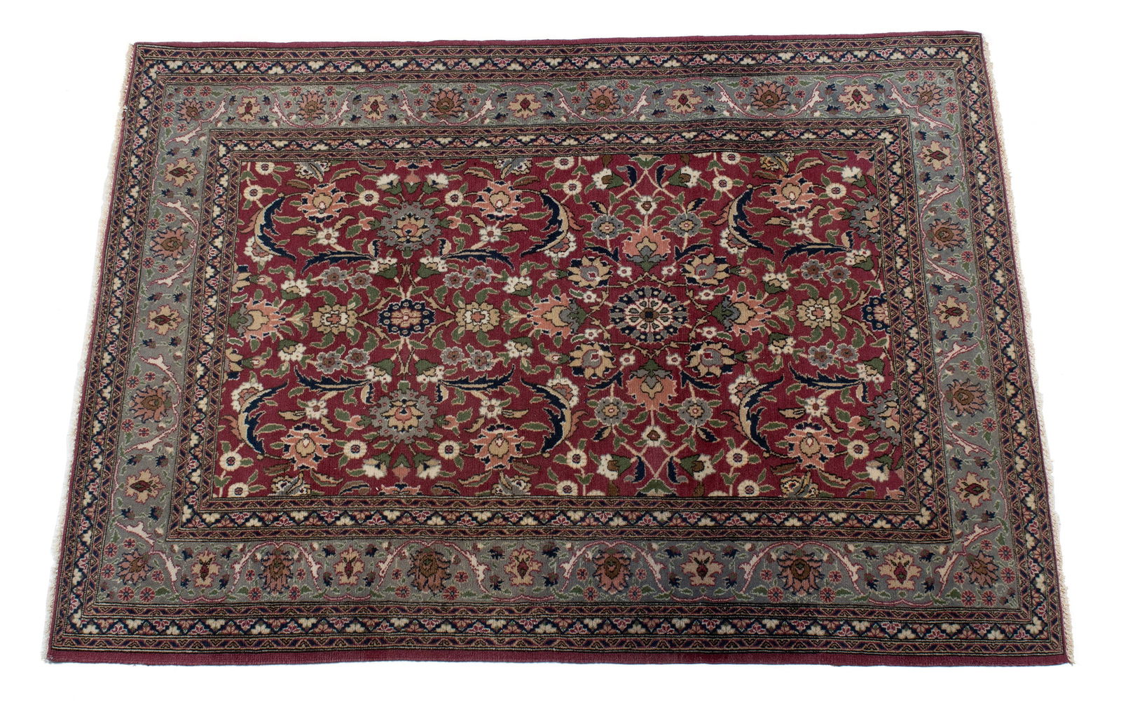 ANATOLIAN AREA RUG: ANATOLIAN AREA RUG Turkish, 20th century. Floral decorated deep red field, grey border with guard borders. 5 ft. 10 in. x 4 ft. 3 in.
