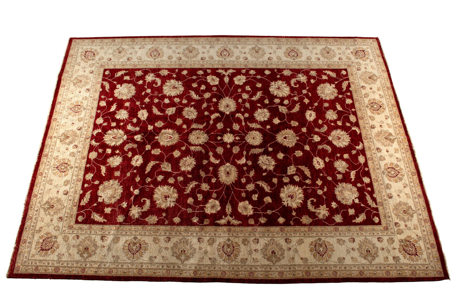 MAHAL DESIGN ROOM RUG: MAHAL DESIGN ROOM RUG Pak, 20th century. Foliate vines decorated the deep red field, ivory border with multiple guard borders. 11 ft. 10 in. x 9 ft.
