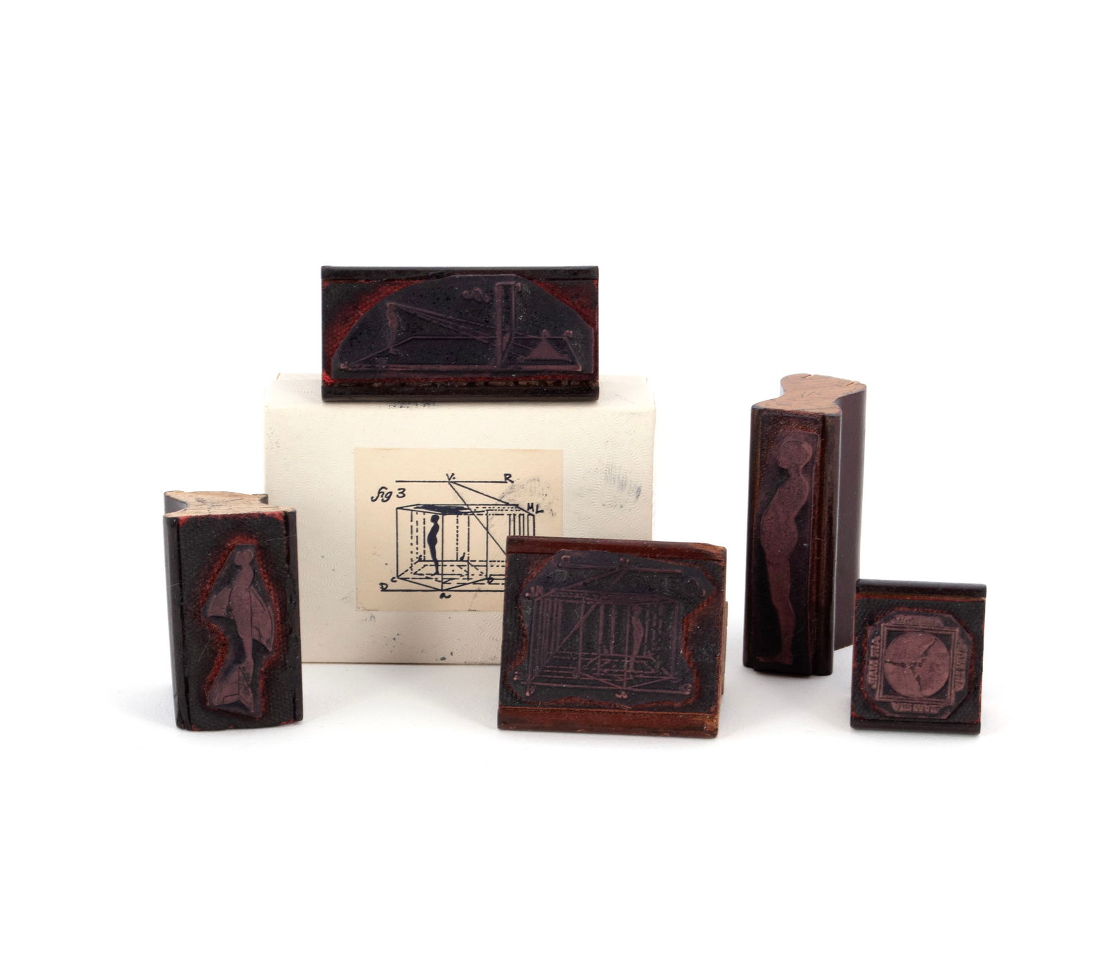 FIVE ERNEST TINO TROVA FALLING MAN RUBBER INK STAMPS: FIVE ERNEST TINO TROVA FALLING MAN RUBBER INK STAMPSOne (1) a slender image of the Falling Man, an "Air Mail" study stamp, a Falling Man airplane figure, and two (2) Falling Man landscape studies.Erne