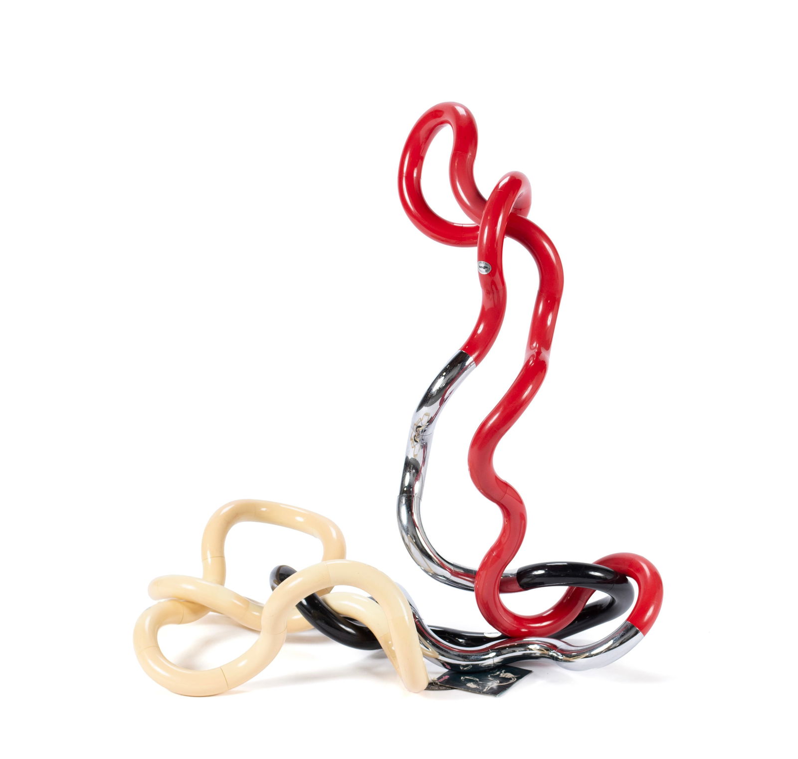 INFINITE TANGLE SCULPTURE BY RICHARD X. ZAWITZ: INFINITE TANGLE SCULPTURE BY RICHARD X. ZAWITZ With original identification tags, plastic & chrome. Black, white, and red with chrome adjustable pieces. 11 x 18 x 28 in. (27.9 x 45.7 x 71.1 cm.)