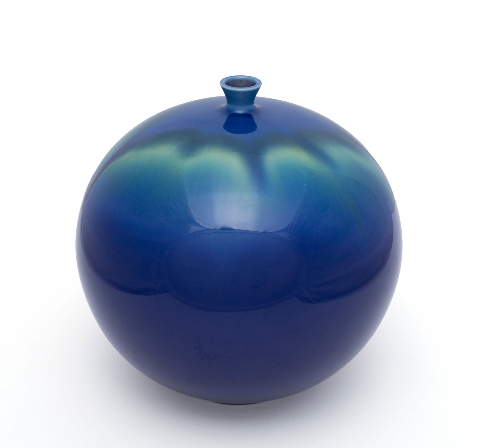 TOKUDA (MASAHIKO) YASOKICHI III (JAPANESE, 1933-2009): Tokuda (Masahiko) Yasokichi III Japanese, 1933-2009 Porcelain Circa 1990s, porcelain, signed underfoot. Saiyu glazed blue and green globular vase. 6 x 6 in. (15.2 x 15.2 cm.) Ex Collection of