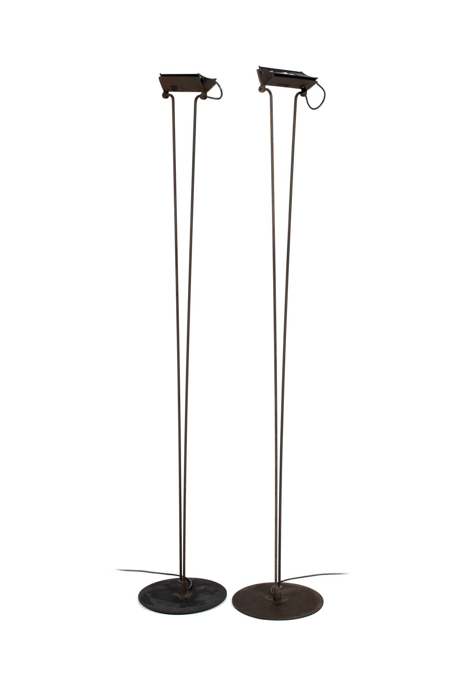 PAIR OF "SILVER CLOUD" FLOOR LAMPS BY PIOTR SIERAKOWSKI FOR KOCK AND LOWY: PAIR OF "SILVER CLOUD" FLOOR LAMPS BY PIOTR SIERAKOWSKI FOR KOCK AND LOWY American, circa 1970s. Halogen fixtures held by two metal rods that lead down to the circular metal base. Each: 73 x 13 in.