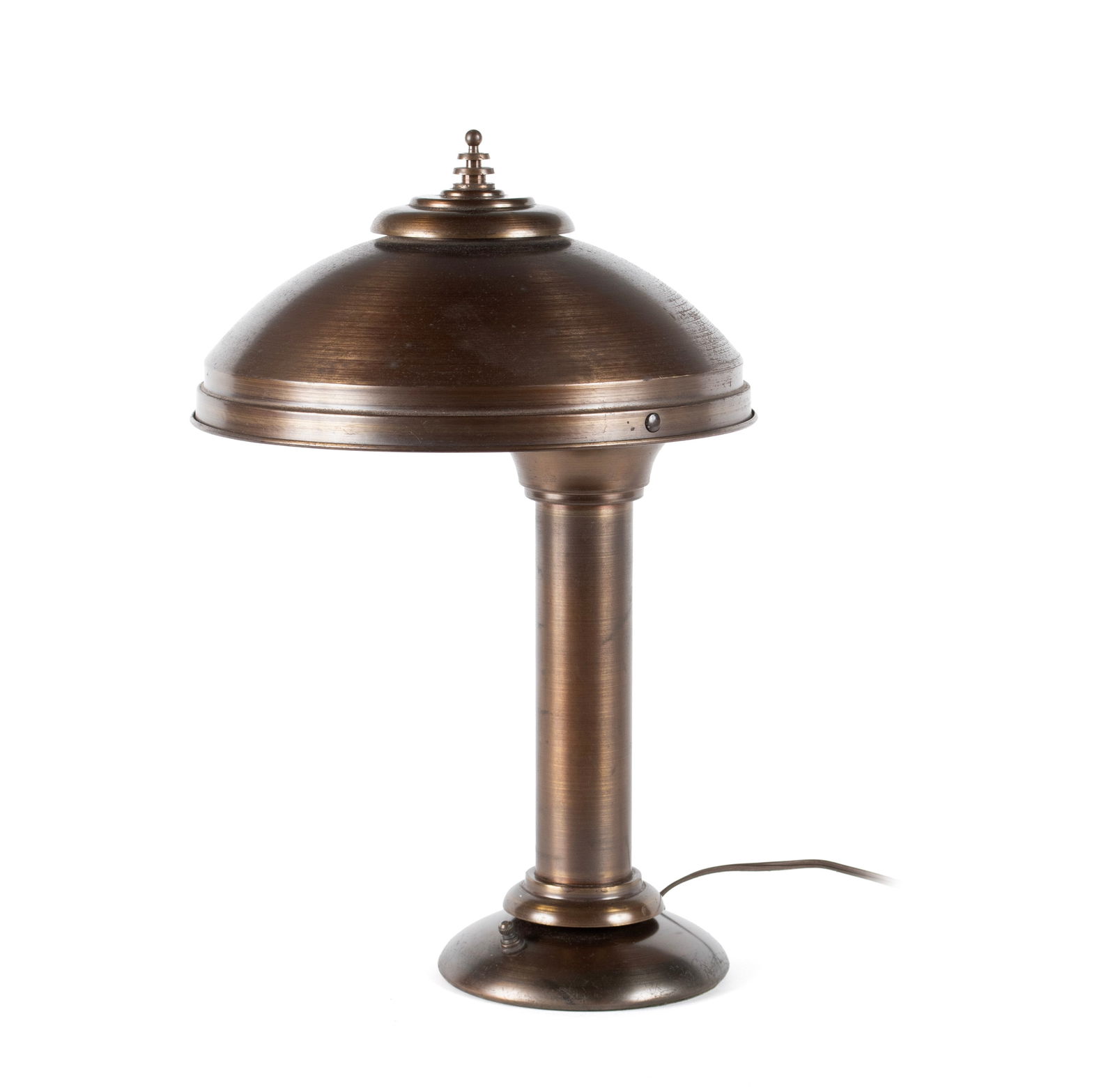 GUARDSMAN DESK LAMP BY FARIES LAMP CO.: GUARDSMAN DESK LAMP BY FARIES LAMP CO. American, circa 1930s, bronze finished metal. Circular shade mounted off center as designed. 17 x 12 in. (43.2 x 30.5 cm.)