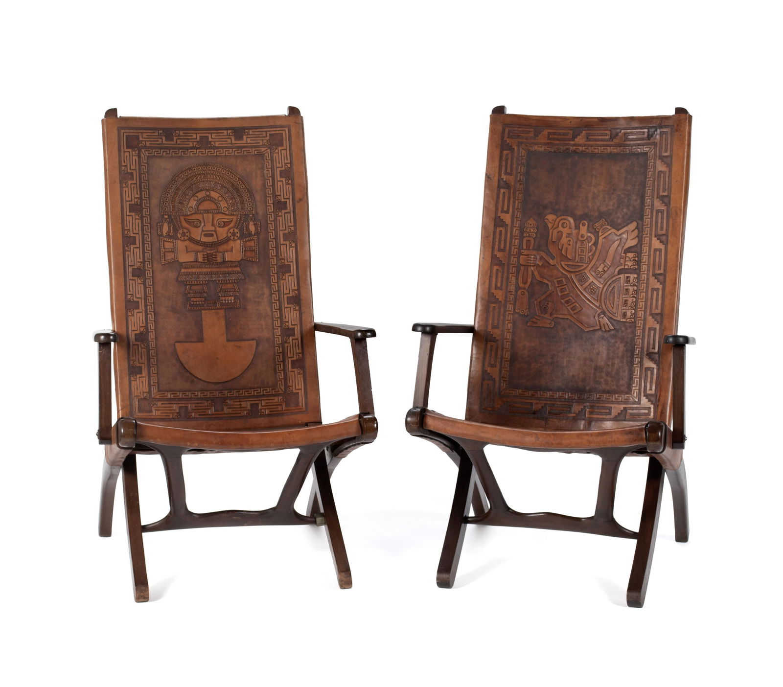 PAIR OF LOUNGERS BY ANGEL PAZMINO FOR MUEBLES DE ESTILO: PAIR OF LOUNGERS BY ANGEL PAZMINO FOR MUEBLES DE ESTILO Ecuadorian, circa 1960s, unsigned. Hand tooled leather, jacaranda wood. Two (2) folding safari lounge chairs with Incan design. Each: 43 1/2 x
