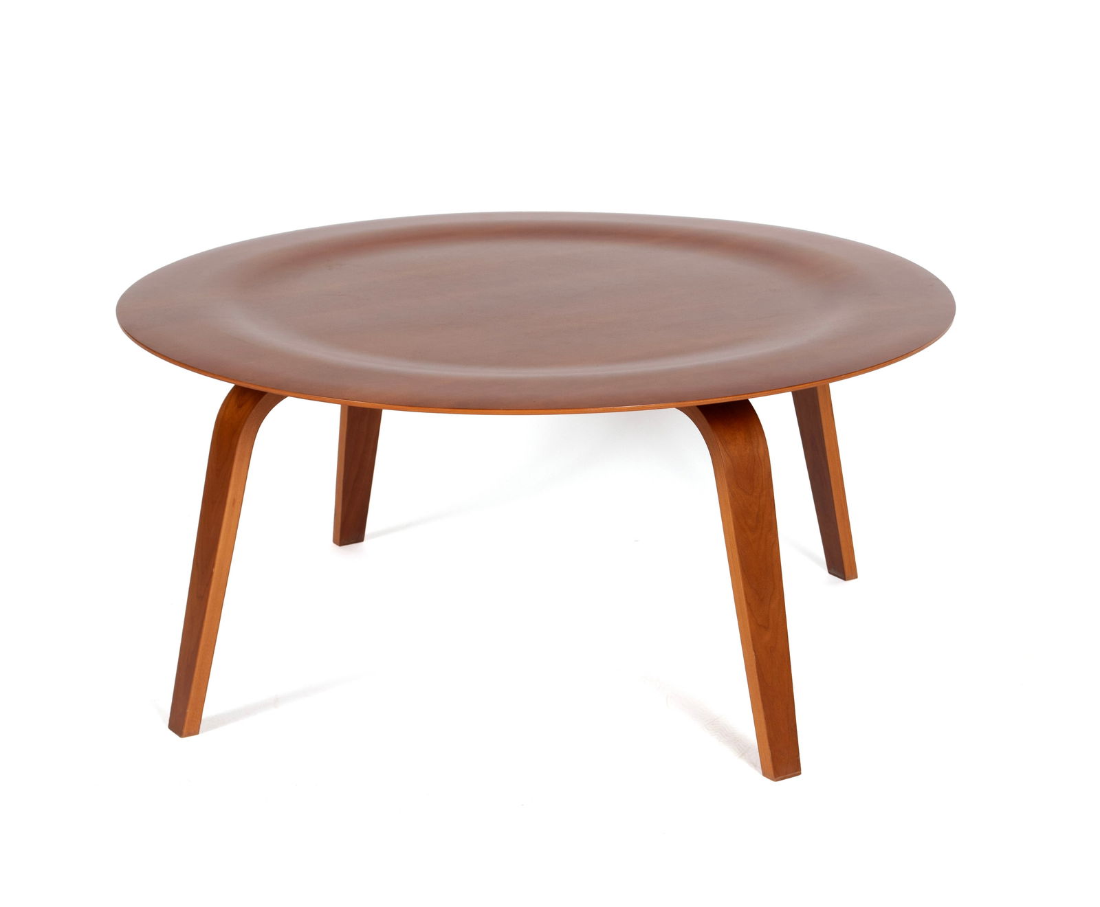 EAMES FOR HERMAN MILLER 'CTW' TABLE: EAMES FOR HERMAN MILLER 'CTW' TABLECirca 2009-present. Round dish top on four curved legs, with label to underside.15 1/2 x 33 3/4 in. (39.4 x 85.7 cm.) Ex Collection of Northland College, Ashland, WI