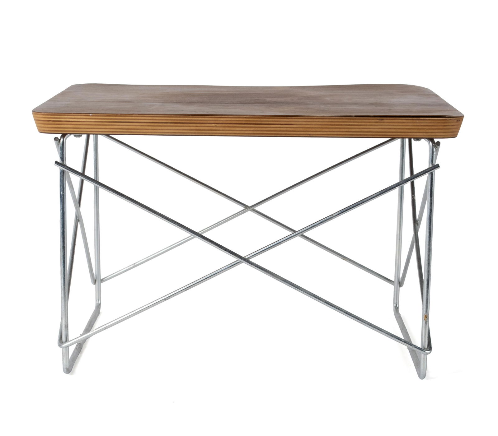 EAMES FOR HERMAN MILLER 'LTR' TABLE: EAMES FOR HERMAN MILLER 'LTR' TABLE 21st century. Chrome and laminated wood top, label on underside. 10 x 15 1/2 x 13 in. (25.4 x 39.4 x 33 cm.)