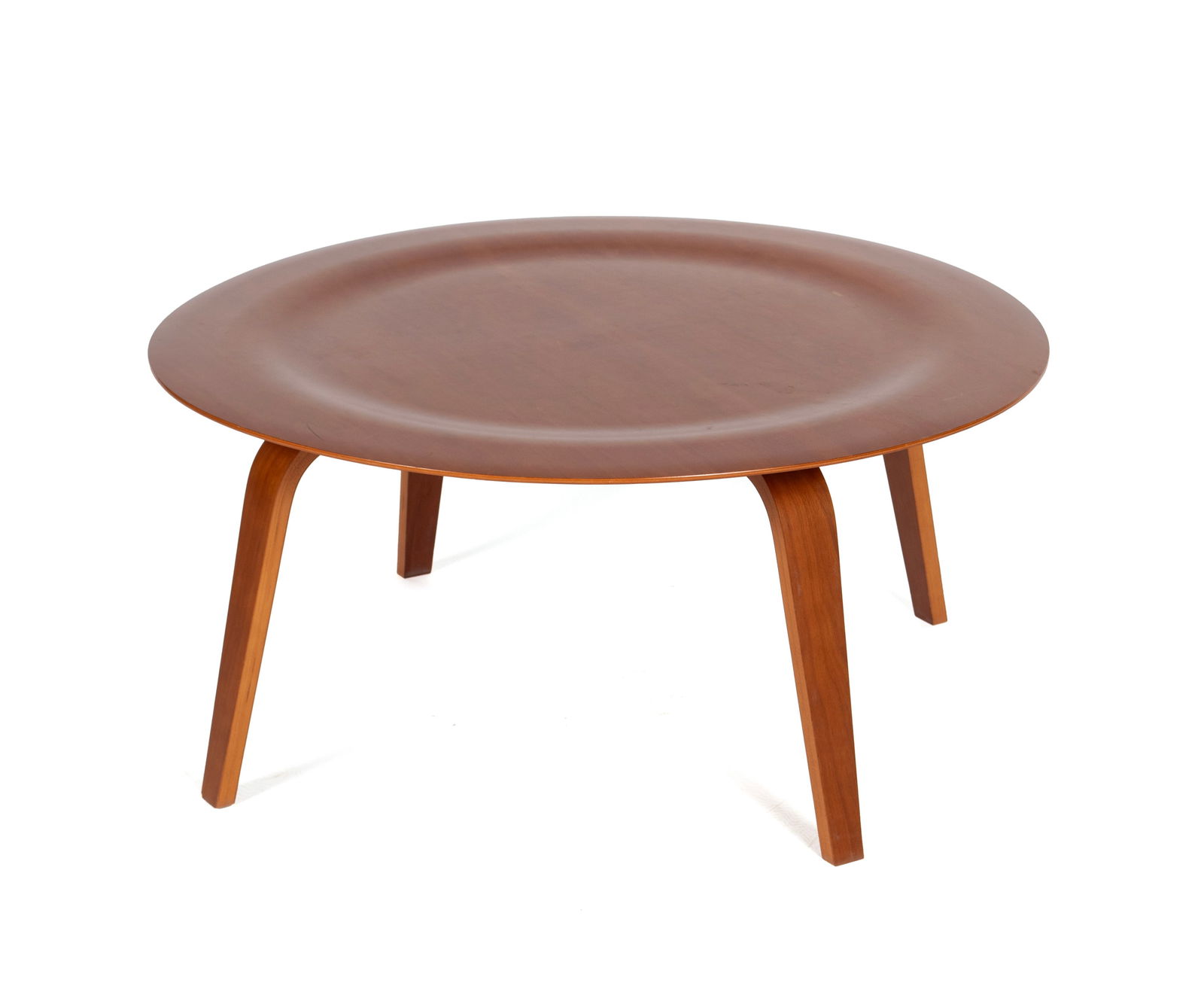 EAMES FOR HERMAN MILLER 'CTW' TABLE: EAMES FOR HERMAN MILLER 'CTW' TABLE Circa 2009-present. Round dish top on four curved legs, with label to underside. 15 1/2 x 33 3/4 in. (39.4 x 85.7 cm.) Ex Collection of Northland College,