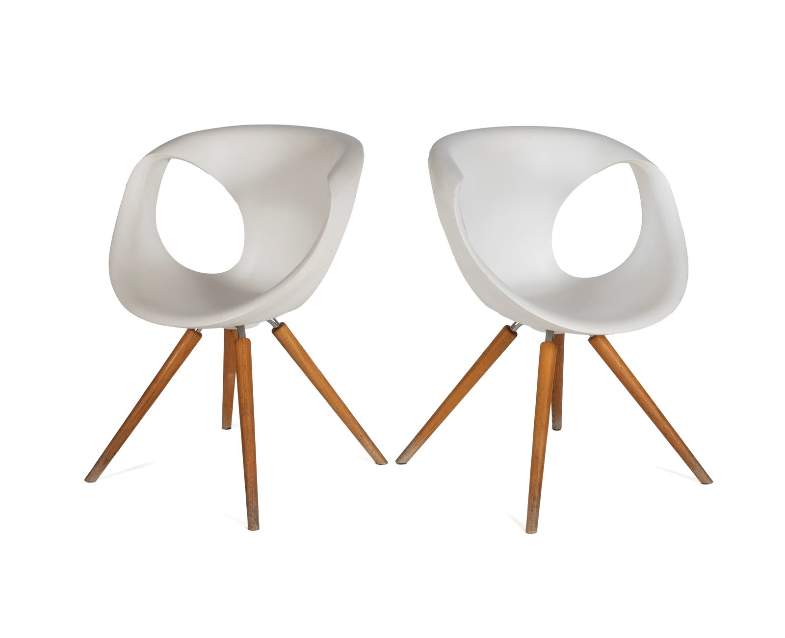 TWO 'UP' CHAIRS BY TONON: TWO 'UP' CHAIRS BY TONON Italian, designed by Martin Ballendat. Two (2) chairs with white polyurethane shells on wooden legs, marked under seat. Each: 32 1/4 x 24 in. (81.9 x 61 cm.) Collection of
