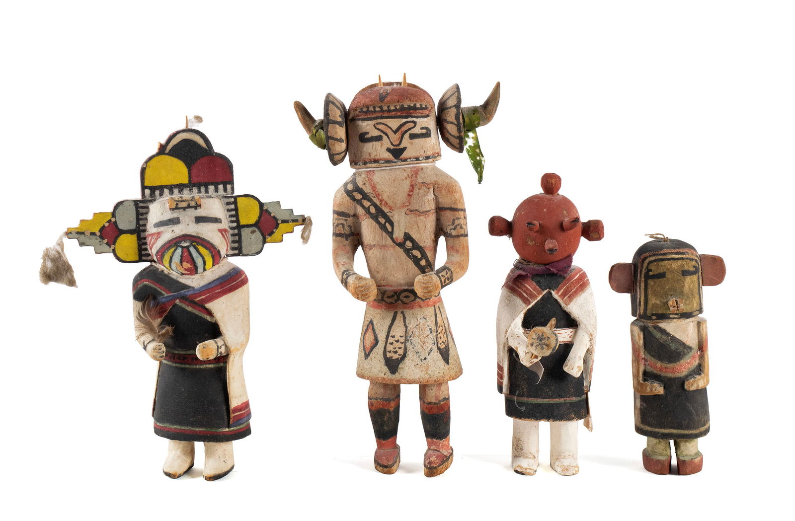 FOUR HOPI KACHINA DOLLS: FOUR HOPI KACHINA DOLLS Arizona, mid-20th century. Polychrome decorated carved Cottonwood Kachina's (Katsina), including an 8.5" tall Mudhead, a 10" tall Palhik Mana, a 6.75" tall Kwasayataqa / skirt