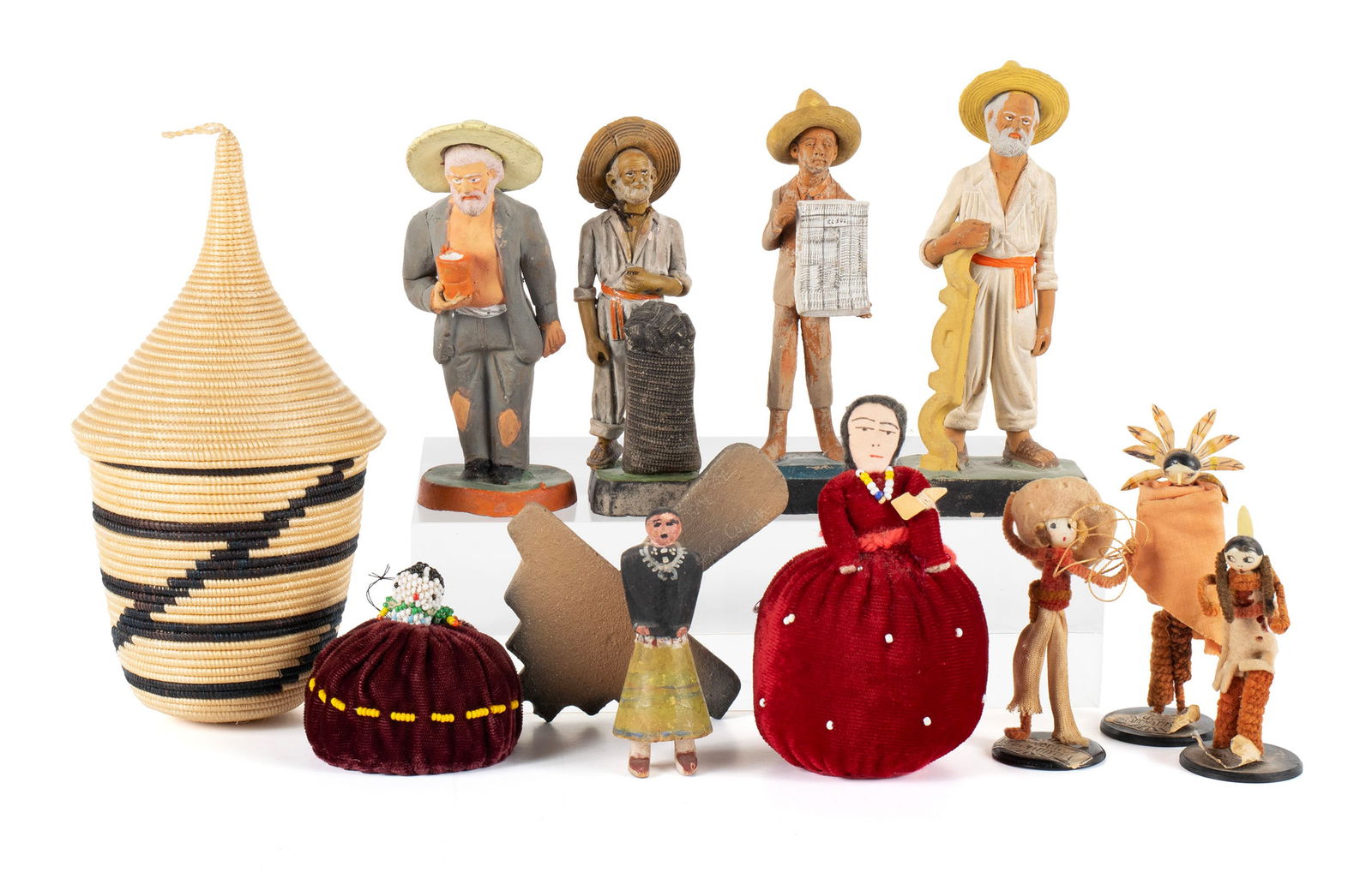 COLLECTION OF ETHNOGRAPHIC ITEMS: COLLECTION OF ETHNOGRAPHIC ITEMS20th century. Twelve pieces consisting of (4) four Mexican Jelesko folk art pottery figures, (3) three pipe-cleaner figures (Souvenir of Oklahoma City), (2) two Navajo