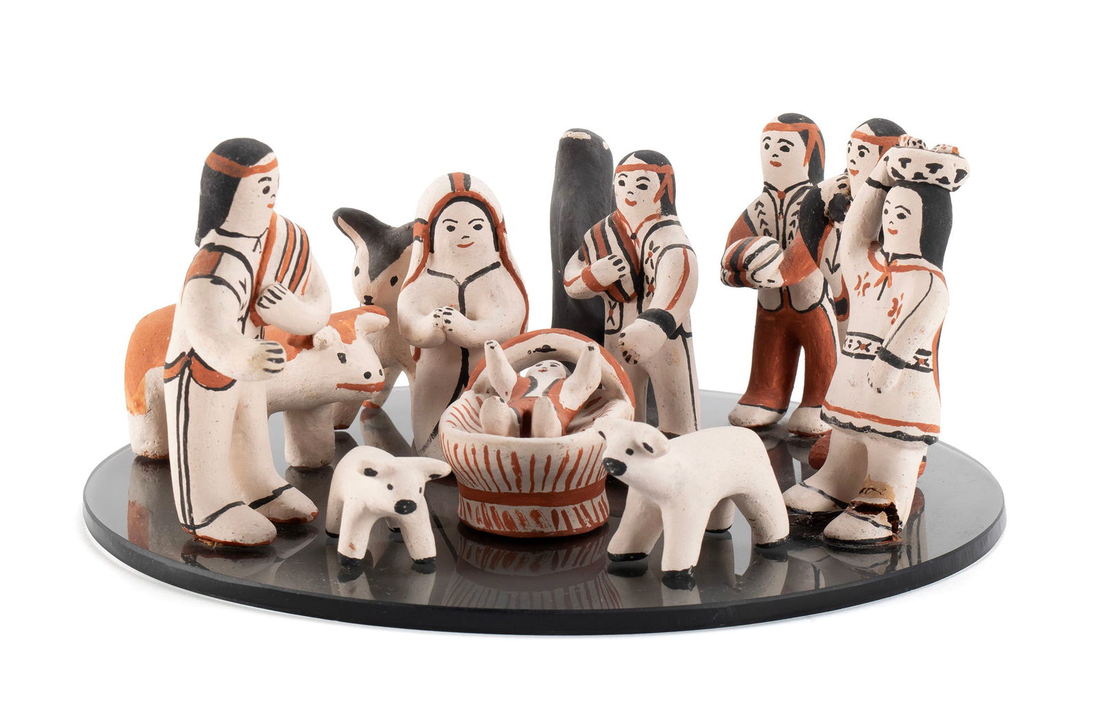 COCHITI POTTERY NATIVITY SCENE BY LAURENCITA HERRERA (1912-1984): COCHITI POTTERY NATIVITY SCENE BY LAURENCITA HERRERA (1912-1984)New Mexico, 2nd half 20th century. Twelve (12) piece nativity scene showing the infant Jesus, Mary, Joseph, three (3) Magi, a shepherd,