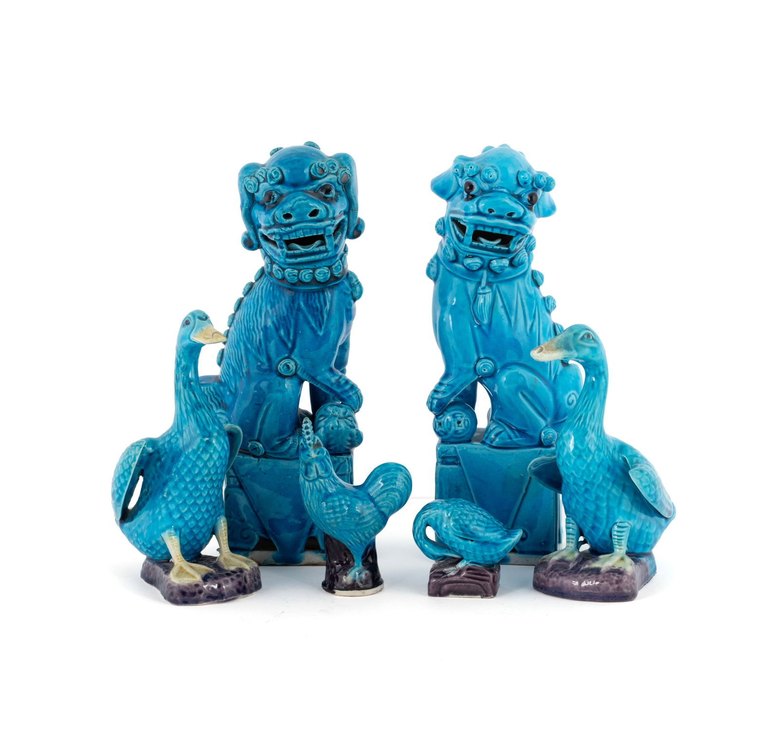 COLLECTION OF CHINESE TURQUOISE GLAZE ANIMALS: COLLECTION OF CHINESE TURQUOISE GLAZE ANIMALS20th century. Six (6) pieces including two foo dogs, a pair of ducks, a small duck and rooster, all marked on underside.Largest: 9 1/4 in. (23.5 cm.), Smal