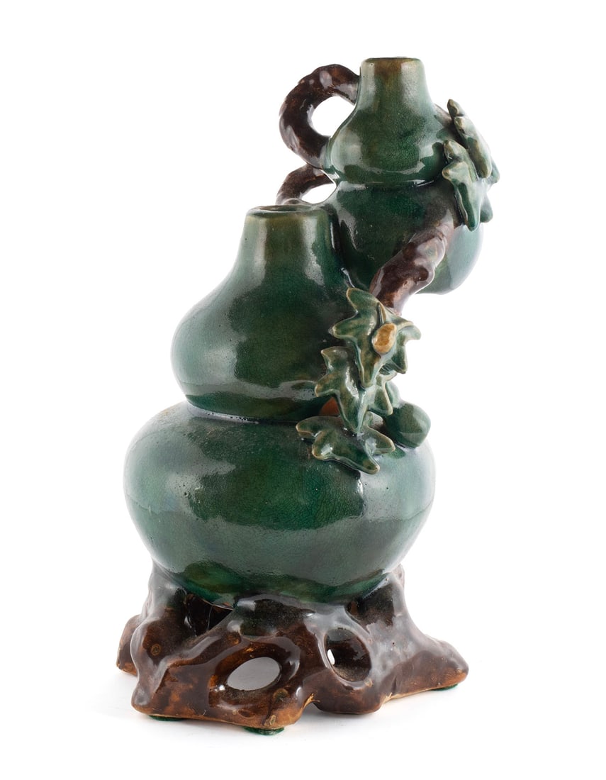 CHINESE STYLE DOUBLE GOURD VASE: CHINESE STYLE DOUBLE GOURD VASE20th Century, glazed porcelain. Dual mouth double gourd vase with raised vine and bug motifs in rich green and brown glaze.12 1/2 x 8 in. (31.8 x 20.3 cm.)