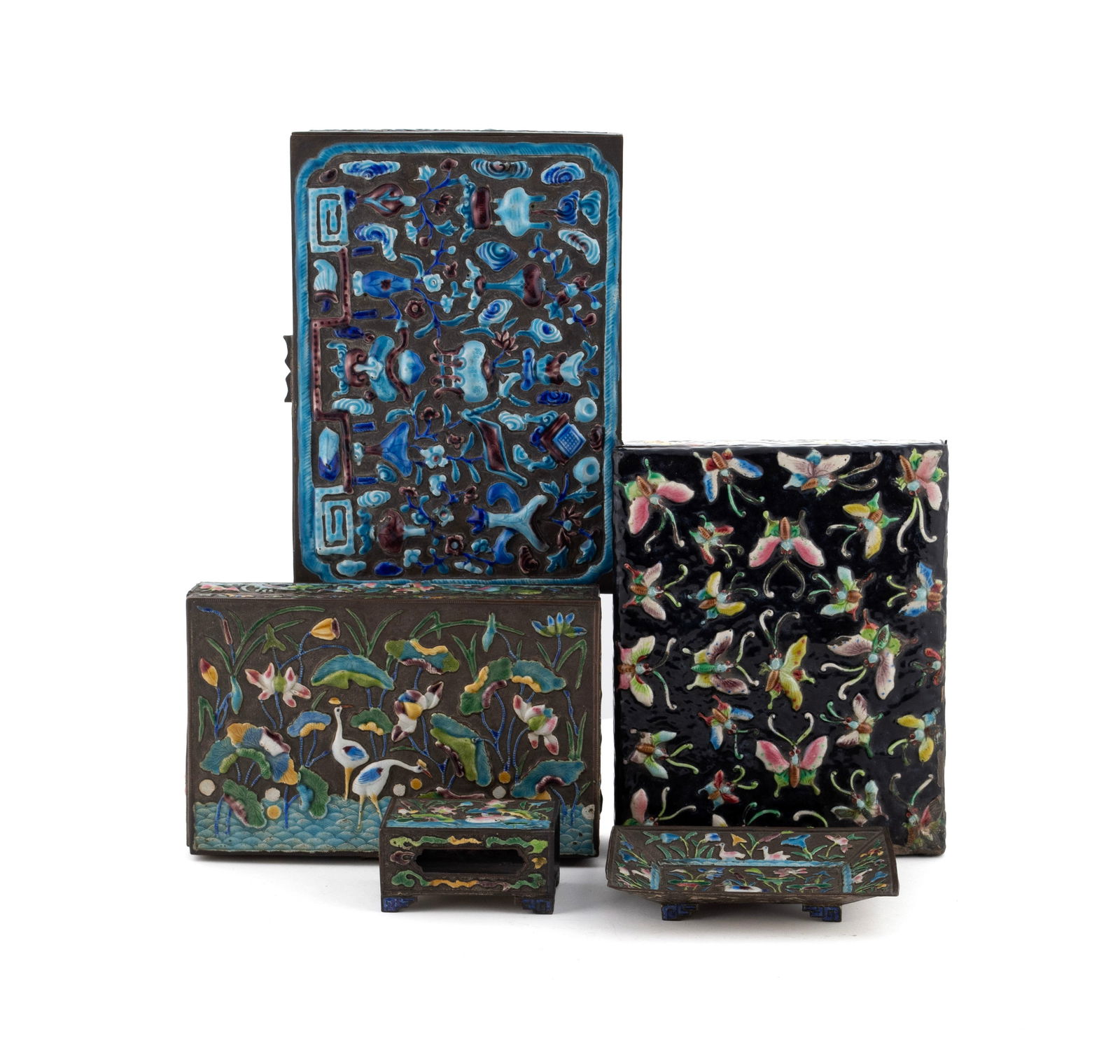 FIVE CHINESE ENAMELED METAL COLLECTIBLES: FIVE CHINESE ENAMELED METAL COLLECTIBLES20th century. Including three boxes, a match book holder and a small rectangular dish.Largest box: 1 1/8 x 6 3/4 x 4 3/4 in. (2.9 x 17.1 x 12.1 cm.)