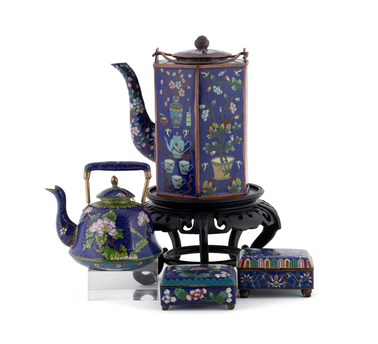 FOUR CLOISONNE COLLECTIBLES: FOUR CLOISONNE COLLECTIBLESChinese, early 20th century. Four (4) pieces in rich cobalt enamel: one (1) large hexagonal tea pot with tea ceremony, pomegranates, and cherry blossoms motifs; a smaller ke