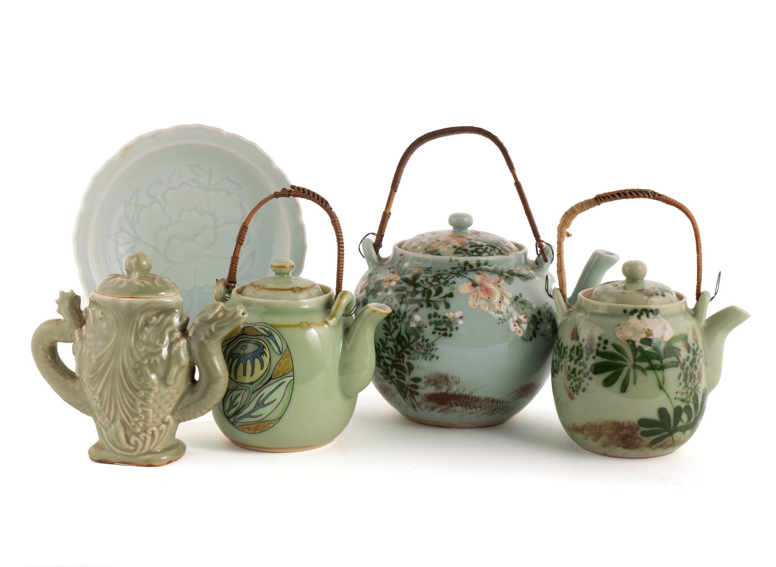 FIVE PIECES OF ASIAN CELADON PORCELAIN: FIVE PIECES OF ASIAN CELADON PORCELAIN20th century. A Chinese Yaozhou Ware style figural "dragon" teapot, a Japanese Imari incised plate, and three Japanese Seto ware teapots.Large teapot 6 1/4 x 6 1/