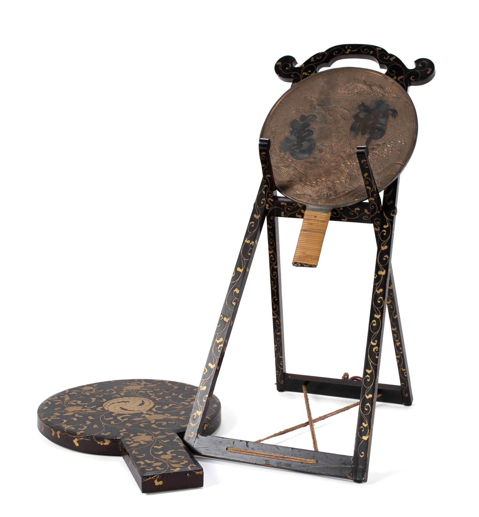 JAPANESE BRONZE MIRROR WITH LACQUERED CASE AND STAND: JAPANESE BRONZE MIRROR WITH LACQUERED CASE AND STAND20th Century. Kagami mirror, case and folding stand with lacquer and gilt decoration.Mirror: 13 x 9 1/4 in. (33 x 23.5 cm.), Stand: 21 1/2 x 10 1/4