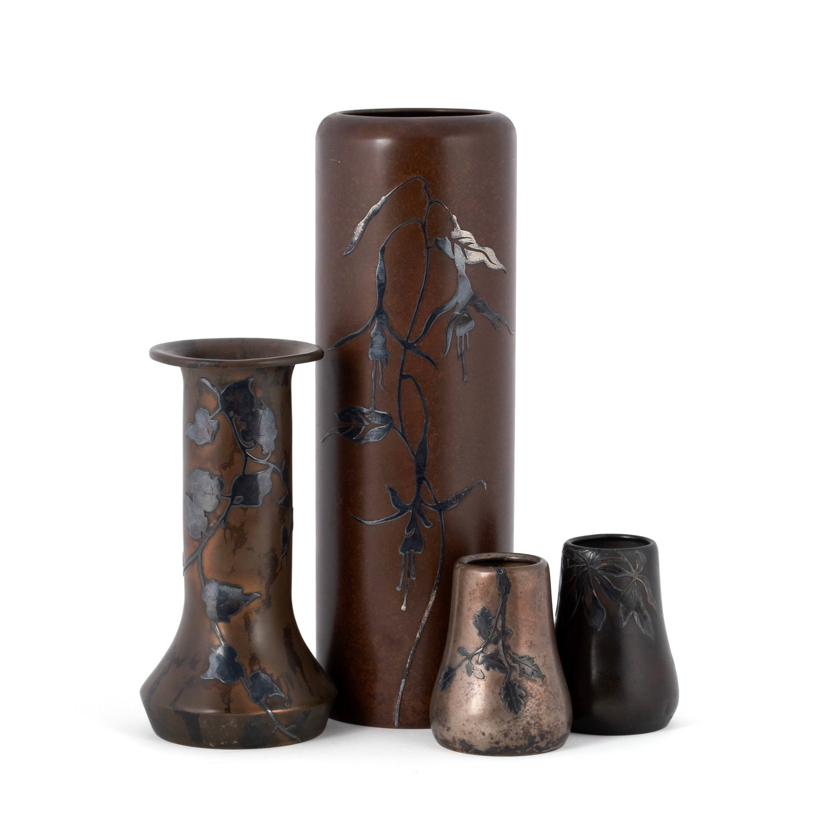 FOUR HEINTZ ART METAL VASES: FOUR HEINTZ ART METAL VASESAmerican, early 20th century. All sterling on bronze, including a tall cylinder vase, a flared bud vase and two short vases, all marked on underside.Largest: 12 in. (30.5 cm