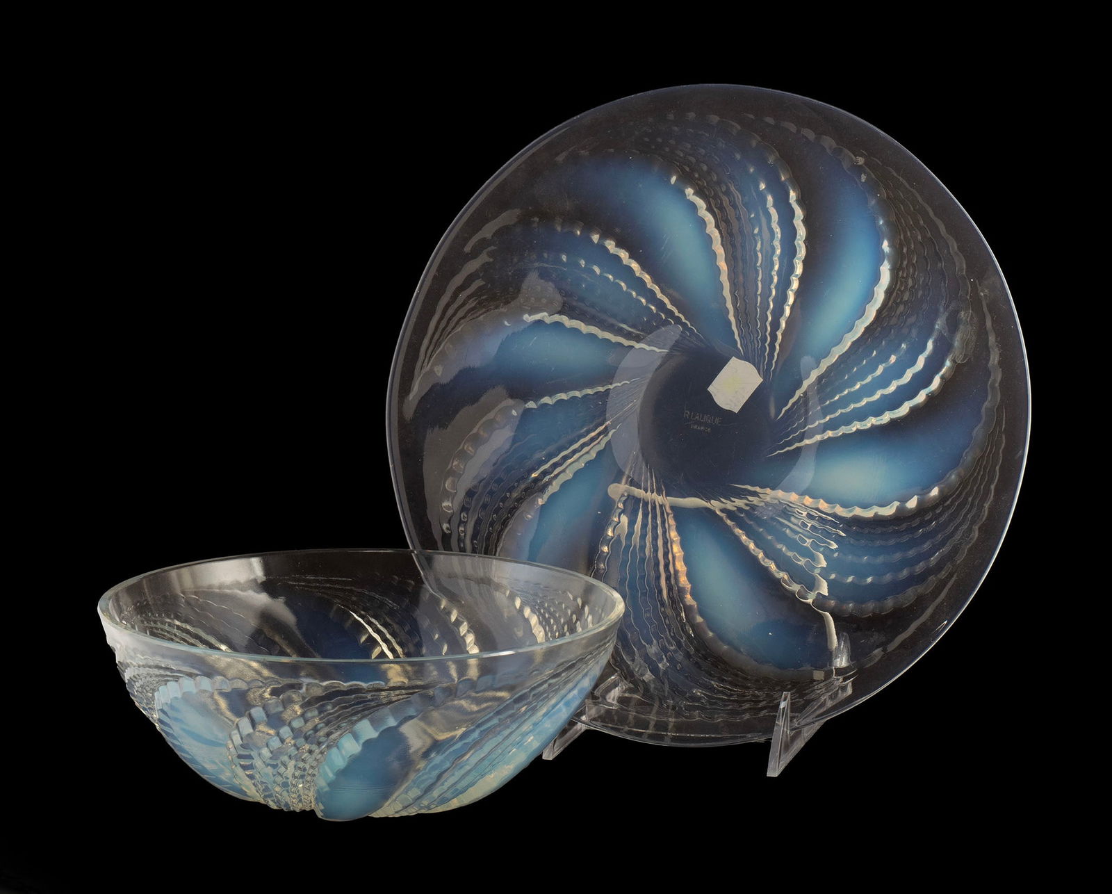 LALIQUE 'FLEURONS' OPALESCENT DISH AND BOWL: LALIQUE 'FLEURONS' OPALESCENT DISH AND BOWL French, 20th century. Both marked 'R Lalique France' on underside. Dish: 10 3/4 in. (27.3 cm.), Bowl: 3 x 8 in. (7.6 x 20.3 cm.)
