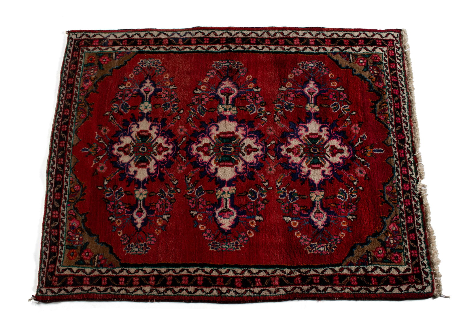 BAHKTIARI AREA RUG: BAHKTIARI AREA RUG Persian, 20th century. Three horizontal foliate medallions decorate the red field with brown corners, navy border with ivory guard borders. 5 ft. x 3 ft. 11 in.
