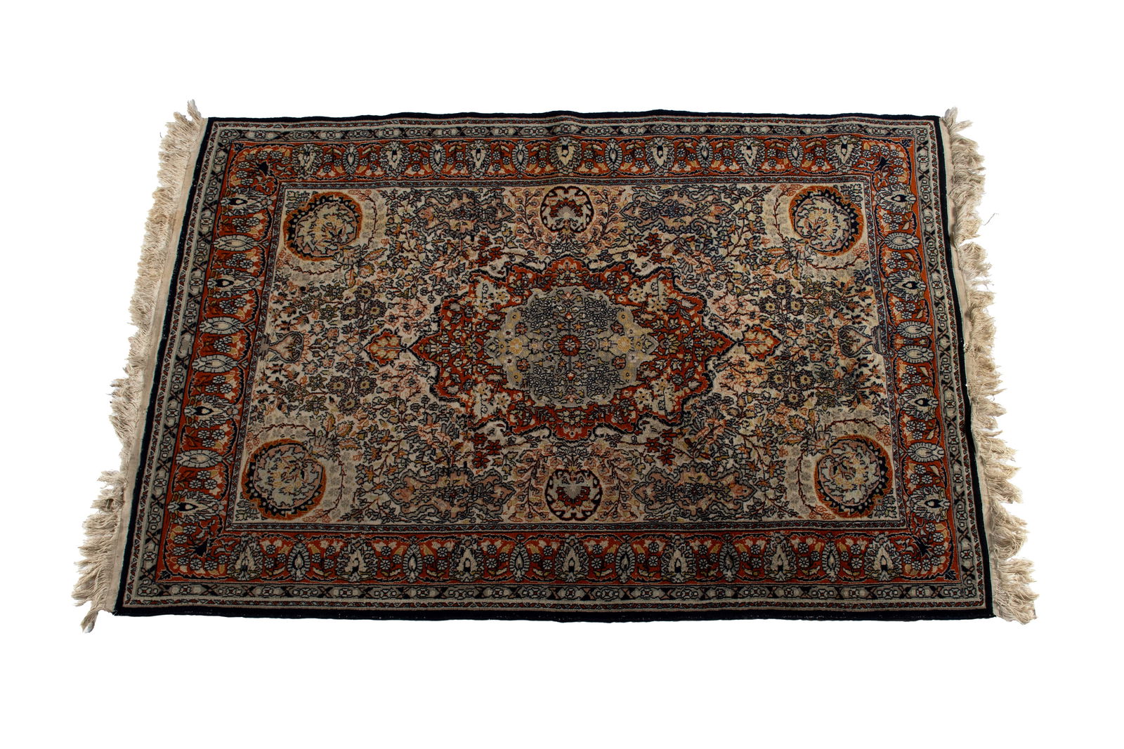 KAYSERI DESIGN AREA RUG: KAYSERI DESIGN AREA RUGPersian, 20th century. Grey on orange foliate pole medallion centers the floral decorated ivory field with palmette medallions at each corner flanking flowering urns to each end