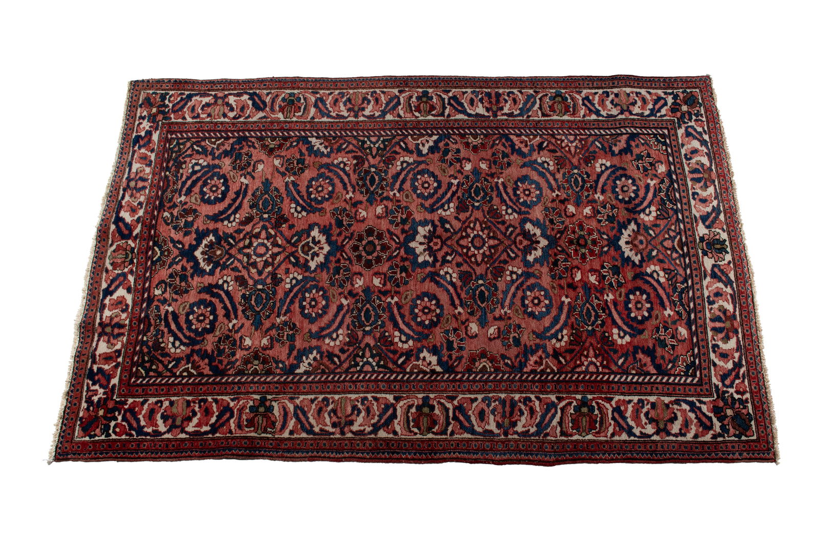 BAHKTIARI AREA RUG: BAHKTIARI AREA RUGPersian, 20th century. Floral medallions and foliate motifs cover the red field, ivory border with guard borders.8 ft. 7 in. x 5 ft. 4 in.