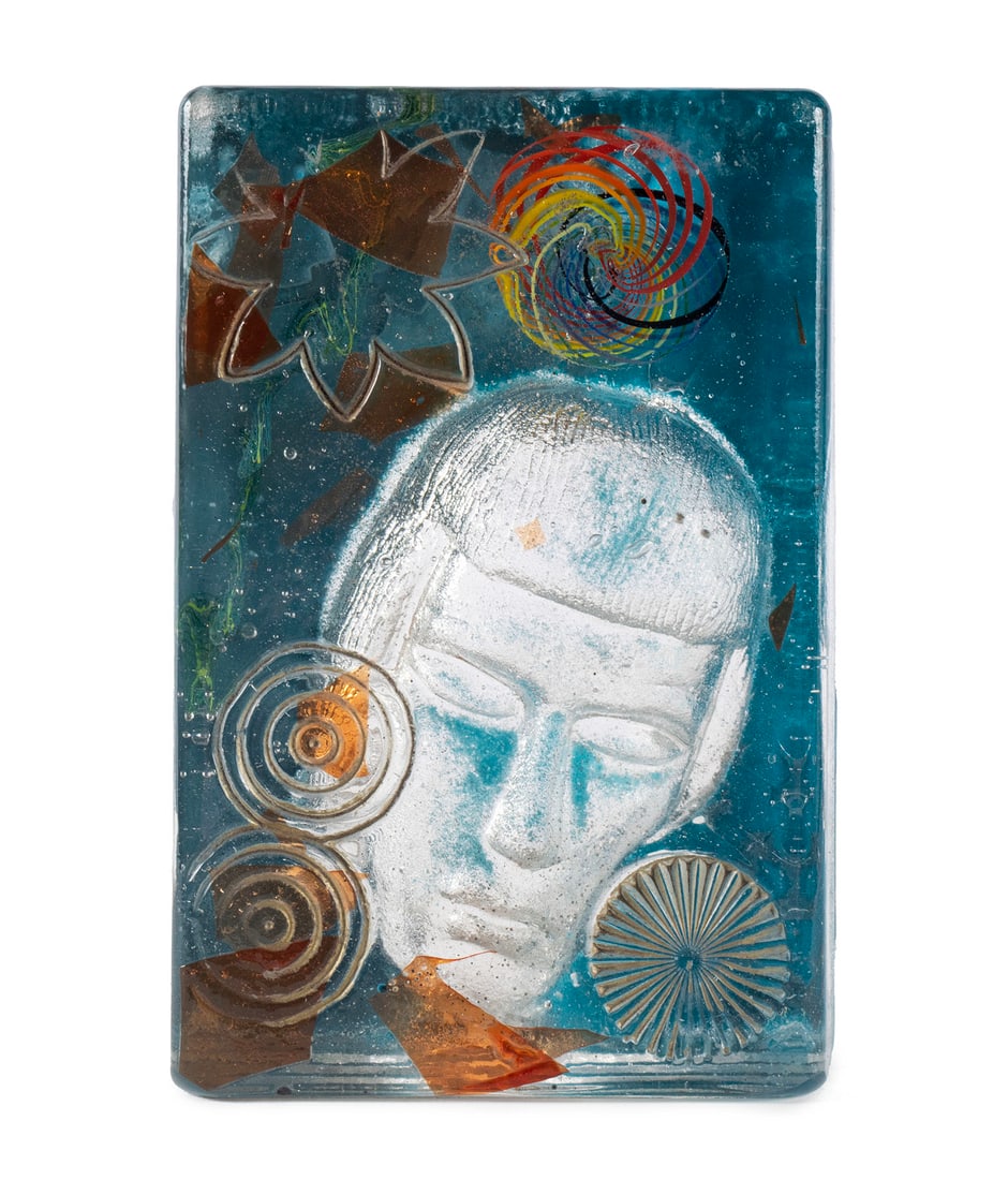 SUSAN GOTT (AMERICAN, B. 1959): Susan Gott American, b. 1959 Glass Signed "Phoenix Studio", colorful wedge form brick incorporating a face and geometric forms. 7 1/2 x 5 1/4 x 2 1/4 in. (19.1 x 13.3 x 5.7 cm.)