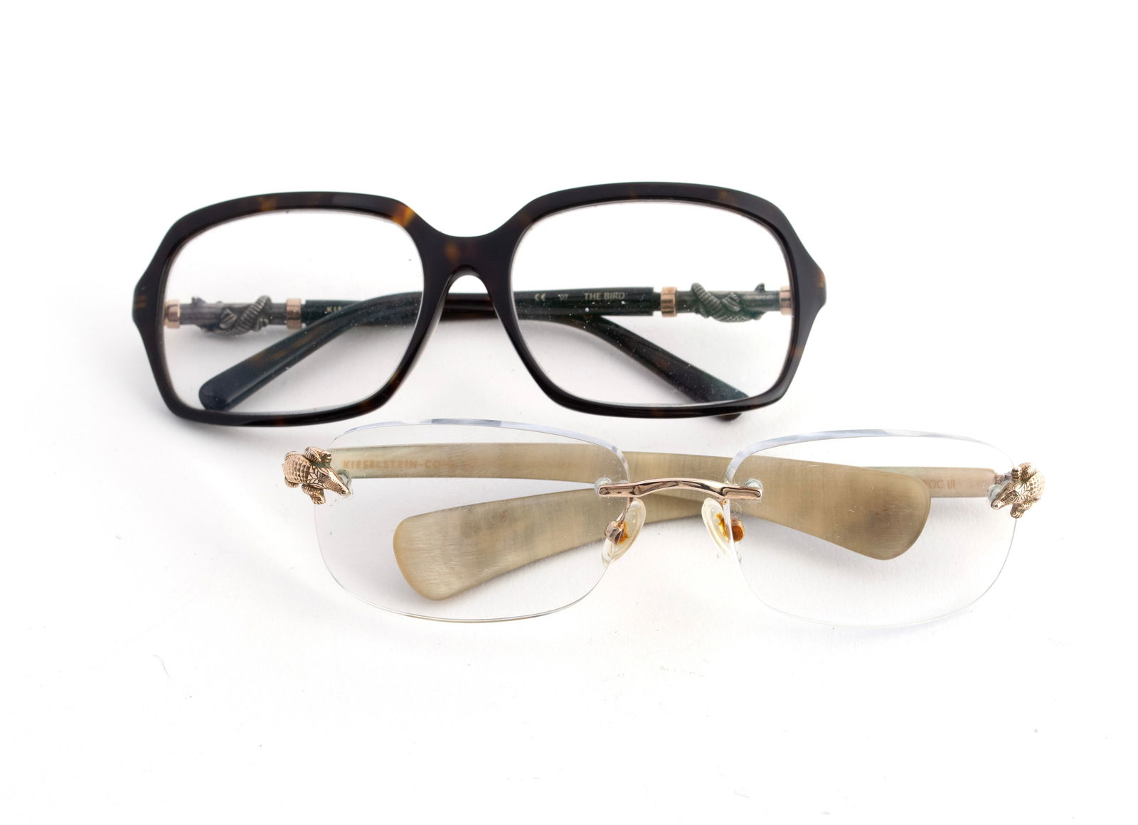 TWO PAIR OF BARRY KIESELSTEIN-CORD ALLIGATOR EYEGLASSES: TWO PAIR OF BARRY KIESELSTEIN-CORD ALLIGATOR EYEGLASSESItalian/American, 20th century. Both with alligator highlights on the temples.2 x 5 3/4 in. (5.1 x 14.6 cm.)