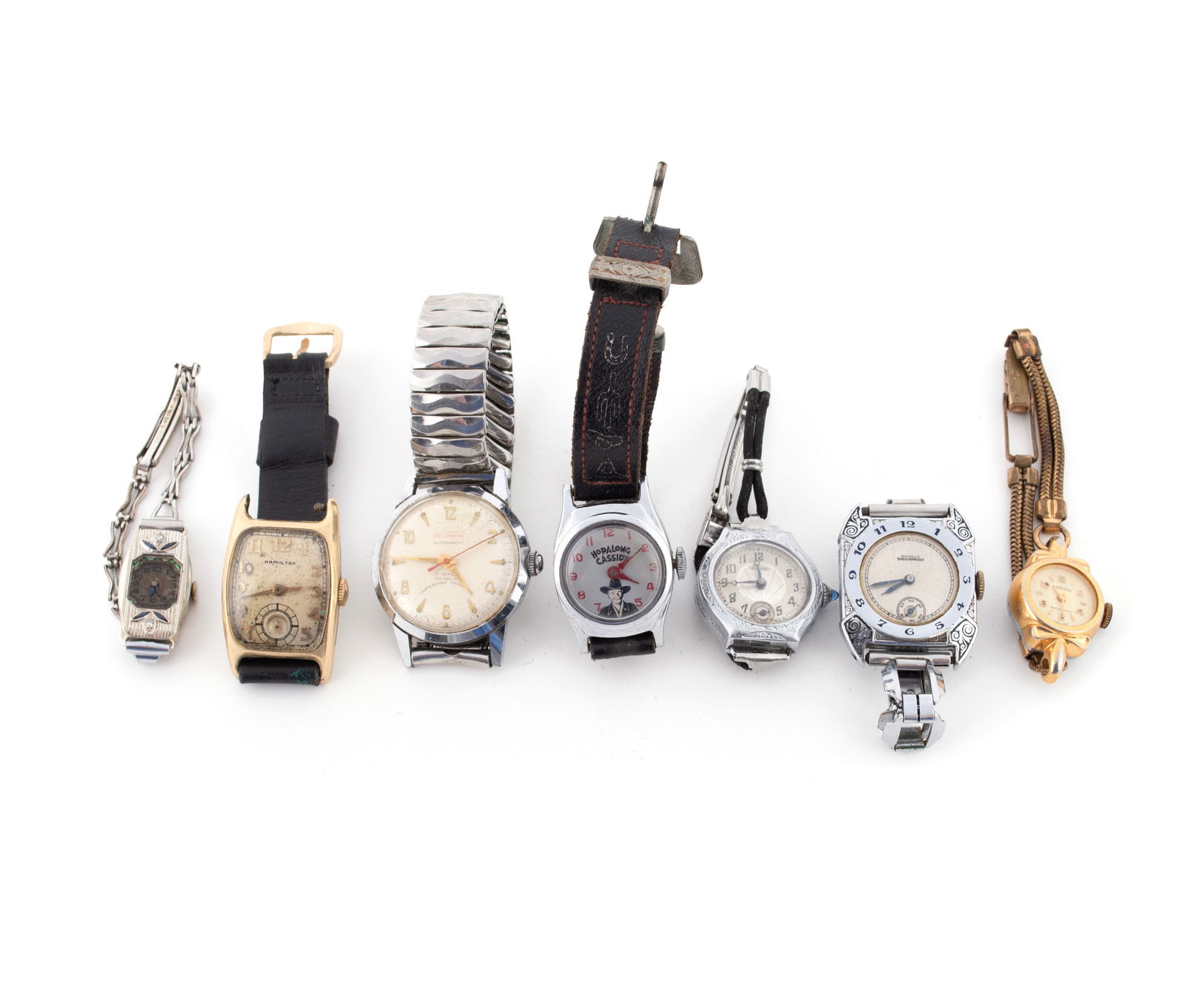 VINTAGE WATCHES AND WATCH PARTS: VINTAGE WATCHES AND WATCH PARTSLadies' art deco watch with 14k white gold case (marked to interior) set with diamonds and sapphire. Missing crystal, enamel dial not original.Ladies' watch by Luor, on