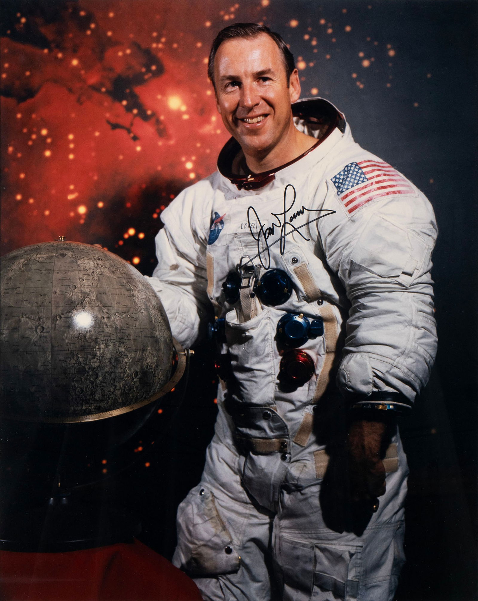ASTRONAUT JAMES LOVELL SIGNED NASA APOLLO 13 PORTRAIT PHOTOGRAPH: ASTRONAUT JAMES LOVELL SIGNED NASA APOLLO 13 PORTRAIT PHOTOGRAPH Signed in black marker across his chest, with COA from Premier Space Editions, framed. Made from the NASA archive negative. Sight: 19