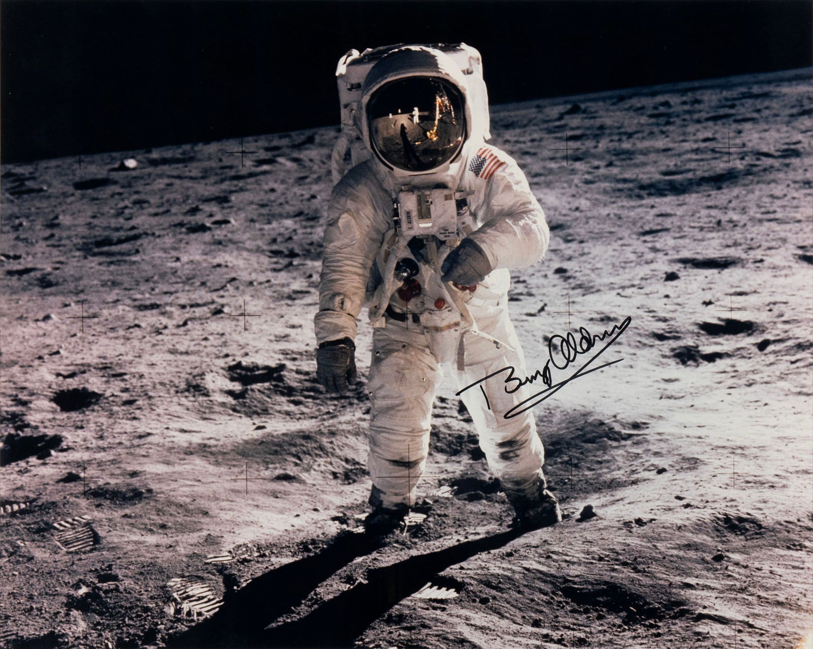 ASTRONAUT BUZZ ALDRIN SIGNED APOLLO 11 PHOTOGRAPH IN SPACE SUIT: ASTRONAUT BUZZ ALDRIN SIGNED APOLLO 11 PHOTOGRAPH IN SPACE SUITSigned in black marker across his left knee, framed.Sight: 15.30 x 19.30 in. (38.9 x 49 cm.), Frame: 20 1/4 x 24 1/4 in. (51.4 x 61.6 cm.
