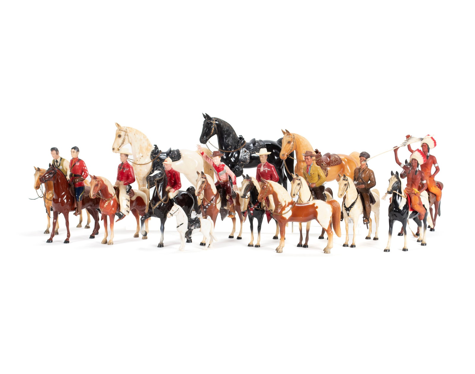 COLLECTION OF HARTLAND FIGURES: COLLECTION OF HARTLAND FIGURES American, circa 1950s. Twenty-four (24) pieces including Wyatt Earp, Davy Crockett, Lance O'Rourke, Turf King racehorse with jockey, Native American figures, Champ