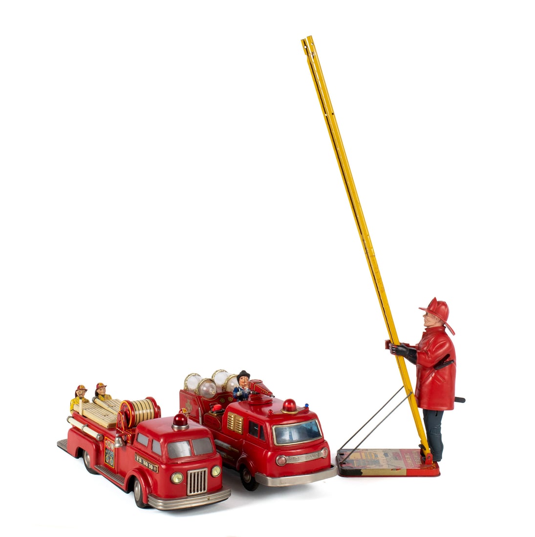 THREE FIREMEN TOYS: THREE FIREMEN TOYSIncludes the MARX "Climbing Fireman and the MARX Linemar "F. D. No. 10" battery operated firetruck. Together with another Japanese battery-operated firetruck.Fireman: 21 3/4 x 3 1/2