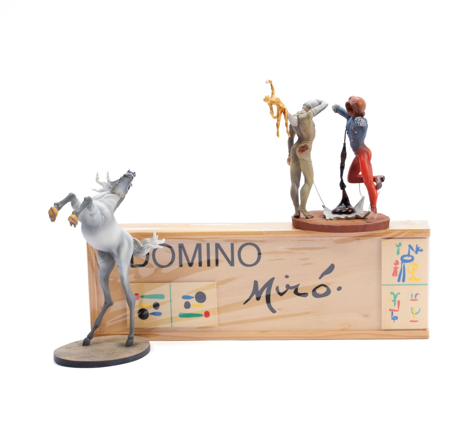 MIRO DOMINOES SET AND TWO SALVADOR DALI COLLECTIBLES: MIRO DOMINOES SET AND TWO SALVADOR DALI COLLECTIBLESA Miro dominoes game set, made in Spain, in original box; and two (2) Parastone Museum Collection figurines in original boxes - "Temptation of St. A