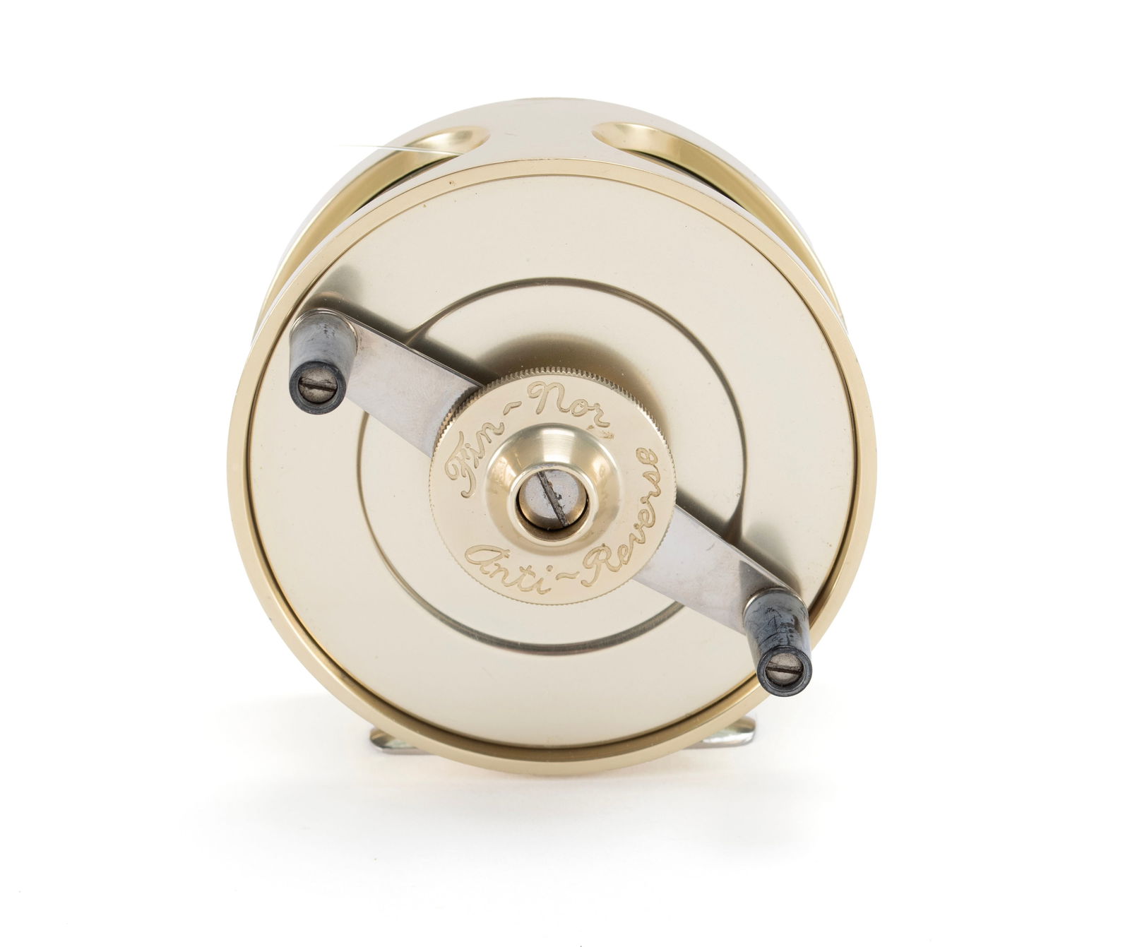 FIN NOR FLY REEL: FIN NOR FLY REELAmerican, marked "3" next to the rod mount plate and 'anti-reverse' with the name, gold finish.Diameter: 3 3/4 in. (9.5 cm.)