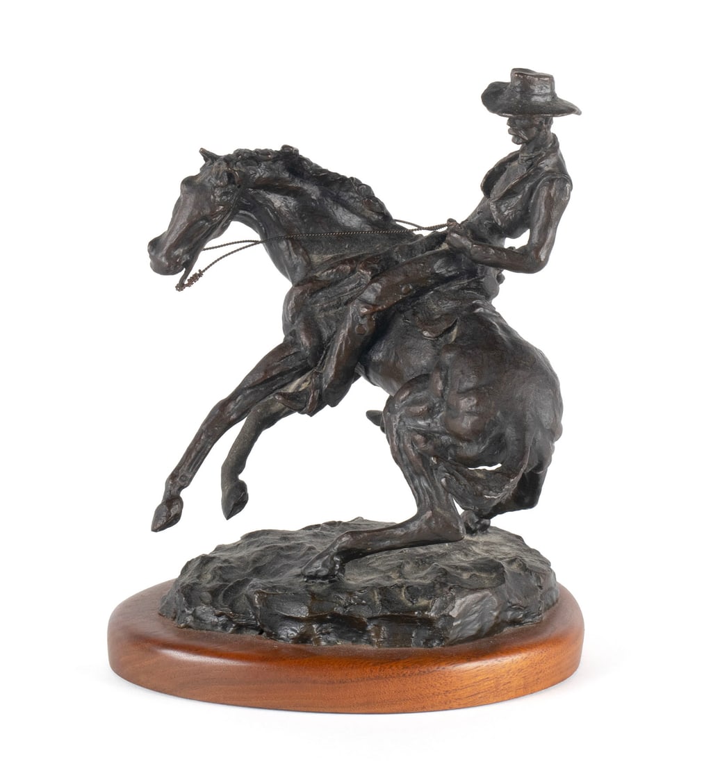 THOMAS HOLLAND (AMERICAN, 1917-2004): Thomas Holland American, 1917-2004 Bronze Signed, numbered 172/350, and dated 1974 in the cast. Cowboy on horseback, mounted on base. 8 1/2 x 6 3/4 x 6.40 in. (21.6 x 17.1 x 16.3 cm.), Fully: 9 1/4 x