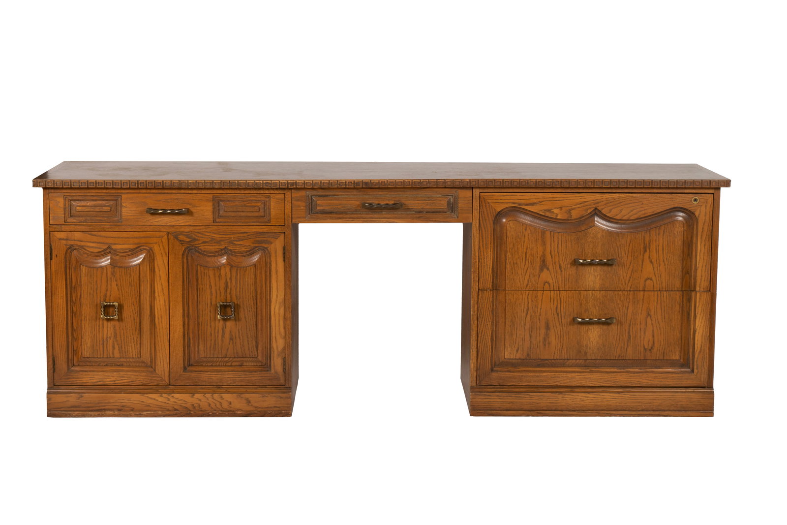ROMWEBER VIKING OAK CREDENZA: ROMWEBER VIKING OAK CREDENZA American, 3rd quarter 20th century. Long rectangular surface with central frieze drawer over the kneehole opening, flanked by drawers to one side and panel doors to the
